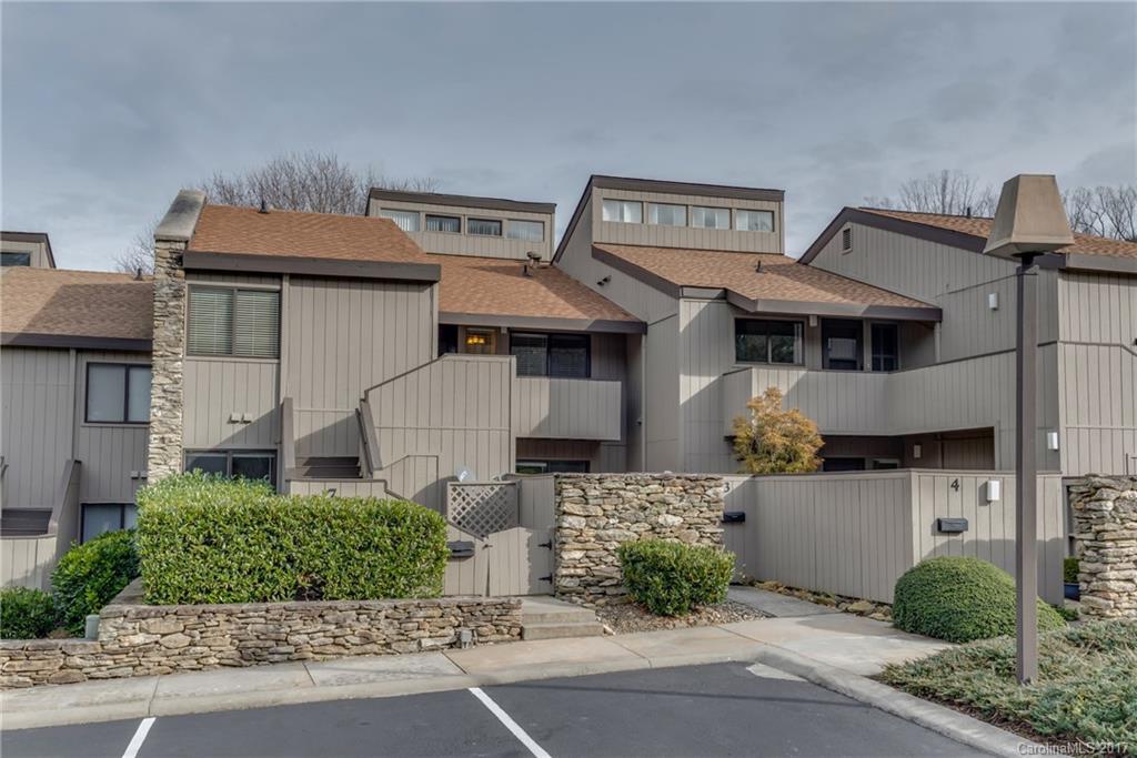 Desirable Lakemoor Village - 2nd story condo with updated kitchen, granite and stainless appliances. Located next to Laurel Park's park and enjoy sidewalks to downtown Hendersonville - just a great location! Easy care tile floors and bonus loft with large storage area. 2 large bedrooms and office/dining room make this a roomy condo. Enjoy the view of the private landscaped pond area from your screened porch.  HOA of $275. monthly includes water and sewer. Earlier reflected sqftg taken from by-laws of Lakemoor Village Cluster One.