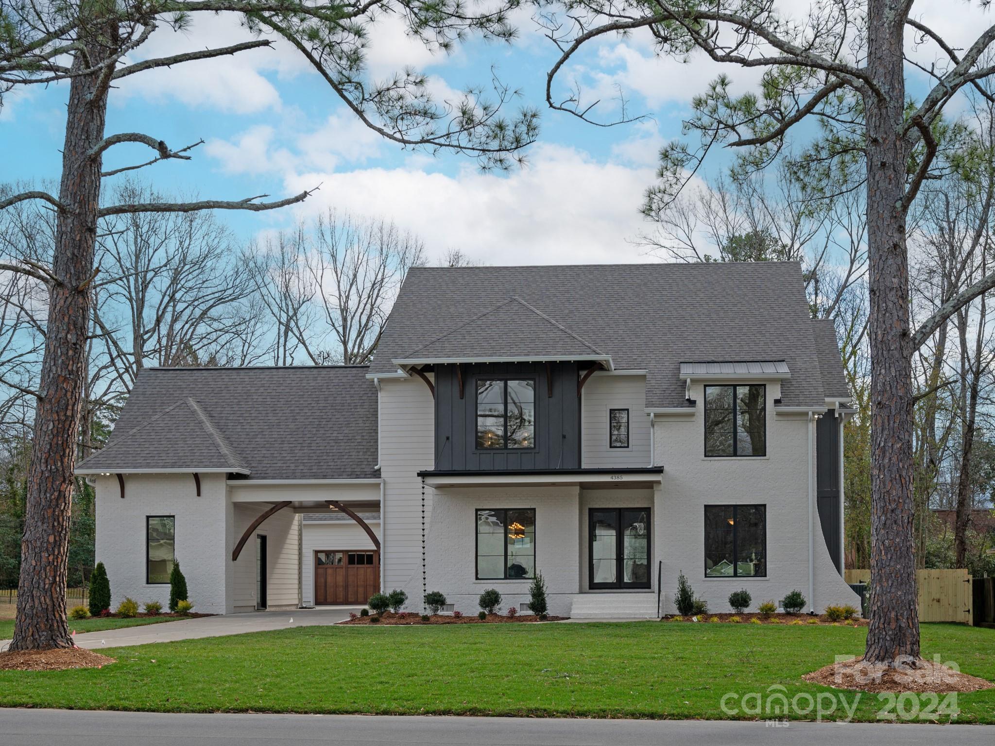 Luxurious new construction home sitting on a beautiful and private, almost half acre lot that's nestled in a quiet community and surrounded by Cotswold and everything else great that Charlotte has to offer (Top Public & Private Schools, Shopping, Dining, Etc...) Absolutely stunning 6 Bed, 6.5 bath, Fully Custom 2.5 story home with an over-sized attached 2 Car and Porte Cochere Garage. Entertaining and spacious covered porch with kitchenette, fireplace and a rooftop terrace overlook the large and private backyard that is just waiting for your personal touch: Pool, fire pit, kitchen, playground, courts, etc... Open floor plan w/ 10' ceilings on main, 9' ceilings upstairs and third Floor Flexroom w/ 9' ceilings & full bath. Coffered & trayed ceilings sprinkled in. 1st and 2nd Floor Primary Suites, Chef's Kitchen with Commercial Grade Appliances, Custom Cabinetry & Over-sized Island. Flex Room over porte cochere.
