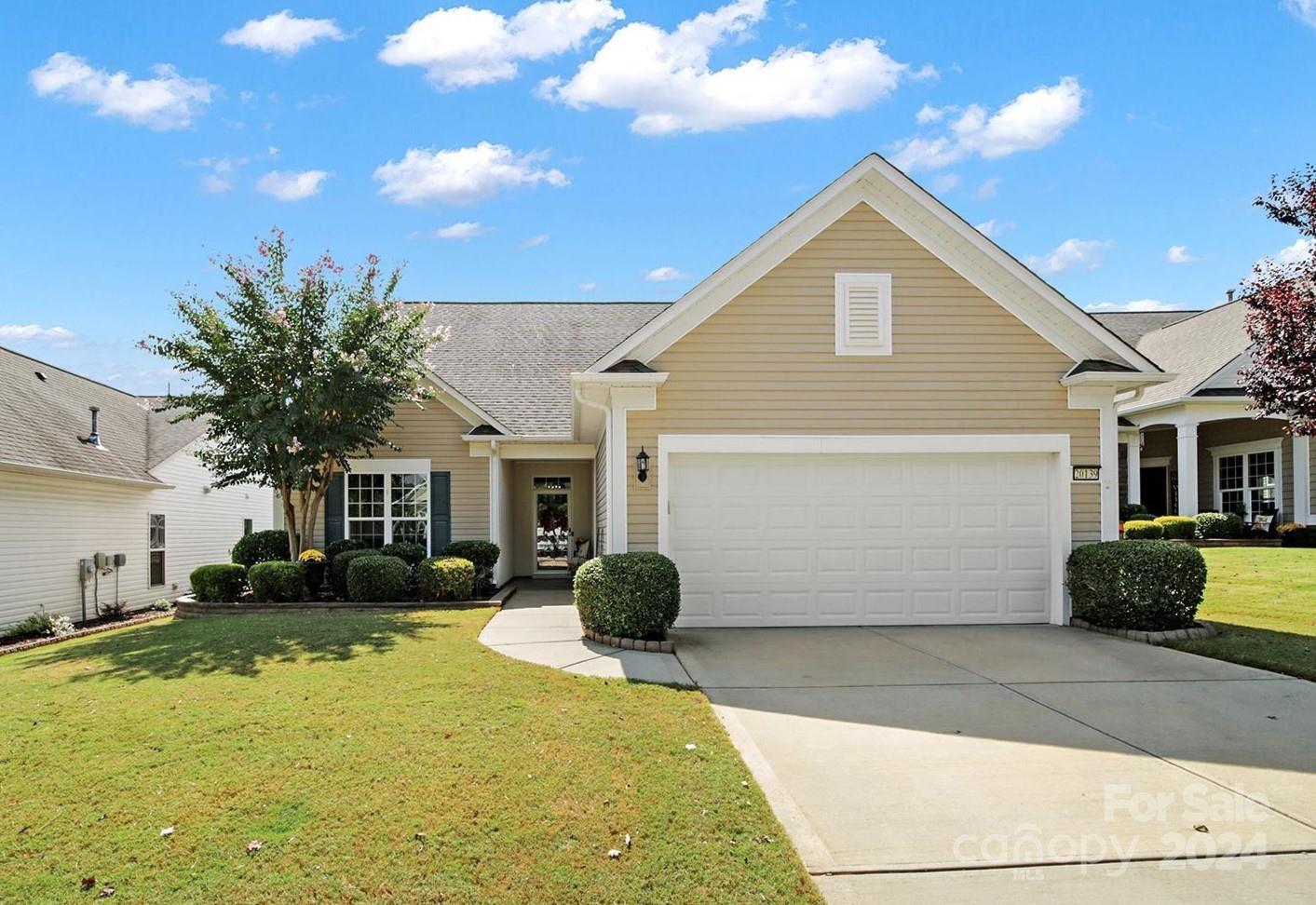 Lovely Copper Ridge loft home that you have been waiting for! The home has bright & updated features with a serene backyard. Hardwood flooring throughout the main living areas, with the comfort of carpet in the bedrooms! Relax & enjoy the fresh Carolina air from the screened porch or from the large paver patio with manicured privacy landscaping. Enjoy cooking in the kitchen that features an angled serving bar w/ seating, SS appliances, light gray cabinets, granite counters, & a pantry. Entertain guests in the great room w/ high ceilings that opens to the large upstairs loft w/ a 3rd bedroom & full bath- perfect for your overnight guests! A flex room w/ French doors offers the perfect spot for a hobby room or den! The bright primary bedroom has an ensuite bathroom w/ a dual sink vanity, make-up vanity, & a walk-in closet! You'll also appreciate the trim work, wainscoting accents, and tasteful paint colors. Come enjoy the many amenities & activities that this 55+ community has to offer!