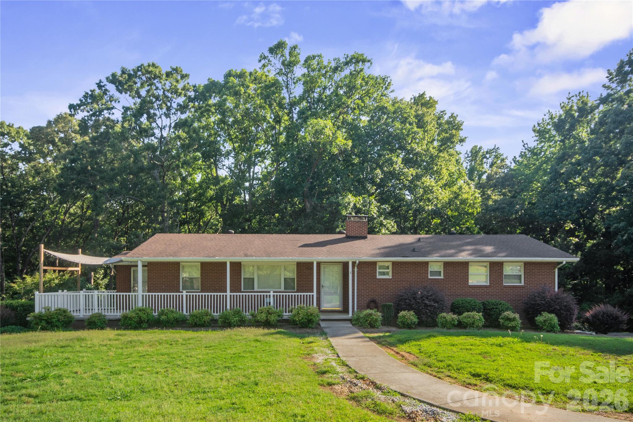 Rare Find in Fort Mill on 3.24 Acres! Endless possibilities await with this ranch home featuring a
basement in one of Fort Mill’s most desirable growing areas! The main level offers 3 bedrooms, 2 full baths,
and a kitchen and living room area. Basement includes a second living space with 1 bedroom, 1
full bath, full kitchen, and living room — ideal for multi-generational living, future rental potential,
or guest space (buyer to verify zoning requirements). Additional finished space not reflected in county
records offers flexibility for a home office, gym, flex space, or additional bedroom. Oversized detached
garage, basement workshop, and beautiful mature trees create the perfect blend of peaceful country living
and incredible investment potential. Possible subdivision opportunity (buyer to verify with York County
zoning). Conveniently located near I-77, shopping, restaurants, hospitals, Carowinds, Carolina Place Mall,
and Uptown Charlotte.
Property sold AS IS!