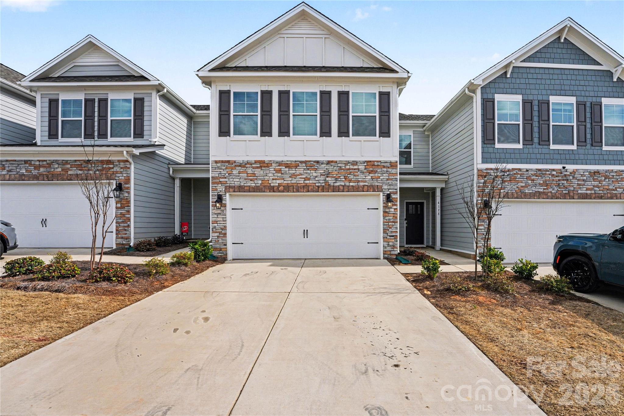 Like-new 2-story townhome in the desirable Blackstone Bay community in Sherrills Ford, offering approximately 2,570 sq ft with 4 bedrooms and 3 full bathrooms. This thoughtfully designed home features an open-concept layout with a bright living area and a modern kitchen equipped with grey cabinetry, granite countertops, tile backsplash, stainless steel appliances, gas range, and a pantry. The main level includes a guest bedroom with a full bath, ideal for visitors or flexible use. Breakfast and dining areas open to a private backyard with patio, creating a comfortable indoor-outdoor flow.

Upstairs, the spacious primary suite offers a walk-in closet and a private bath, while two additional bedrooms, a full bathroom, a versatile loft space, and a convenient laundry area complete the second floor. Additional highlights include a welcoming front porch and a 2-car front-entry garage.

Residents enjoy community amenities including a pool with cabana, dog park, and sidewalks. Ideally located near Lake Norman, with easy access to boating, dining, and outdoor recreation, as well as nearby shopping and everyday conveniences in Sherrills Ford and Denver.