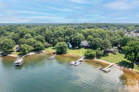 Beautiful waterfront lot on Lake Norman! Wonderful location off Sam Furr Rd. (Exit 25) Close to Birkdale Village, shopping, schools, waterfront parks, and restaurants. Rare .8-acre lot with year-round water views! Beautiful 100-year-old trees on property.