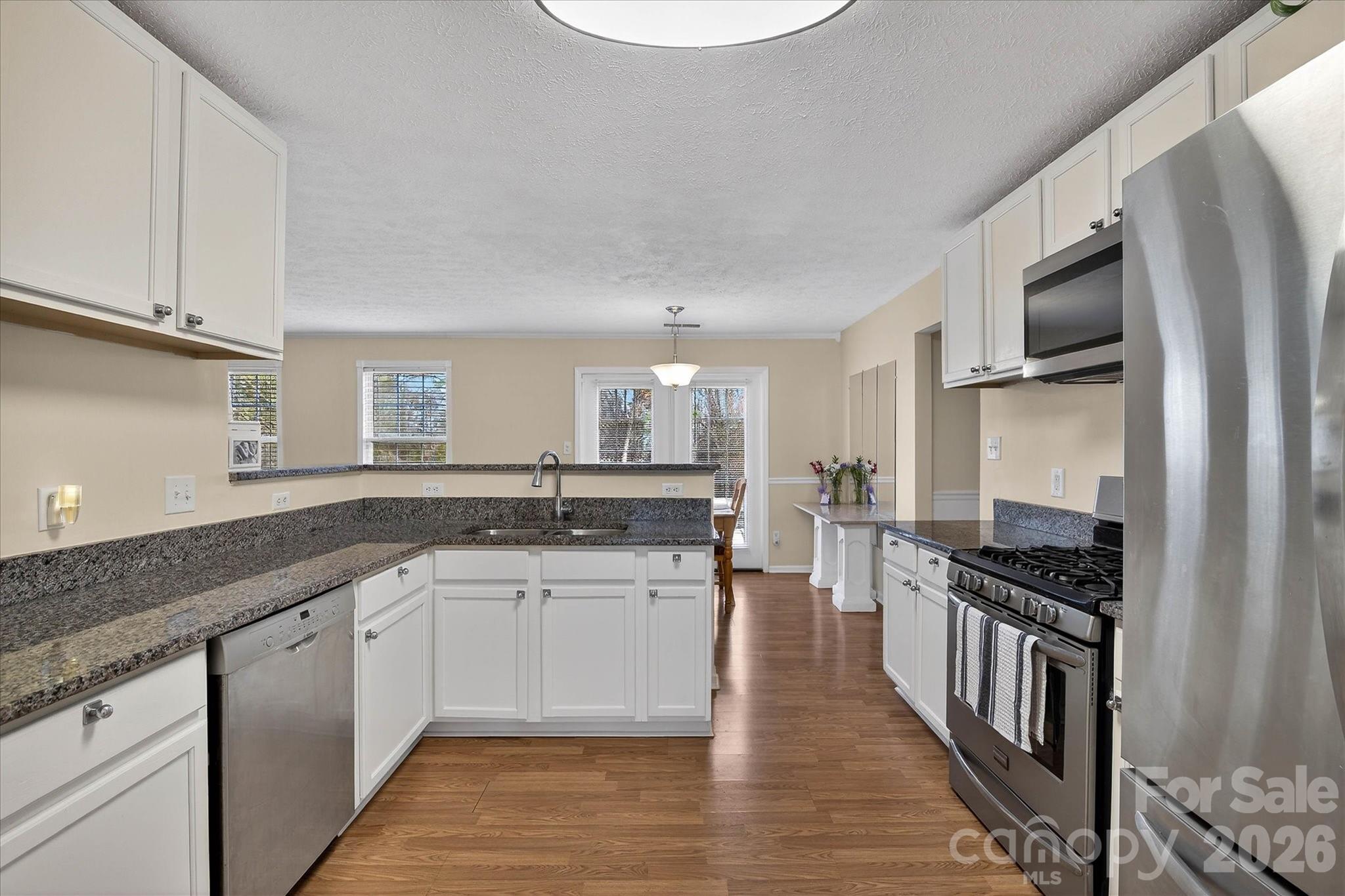 Spacious and inviting large 4-bedroom, 3-bath home offering over 2,440 square feet of comfortable living space on a generous 0.30-acre level lot. Designed with both everyday living and entertaining in mind, this home features a formal dining room and separate living room, providing flexible space for gatherings, a home office, or playroom.
The home flows effortlessly into the main living areas, while the well-appointed kitchen offers ample space for meal preparation, creating the perfect gathering spot for family and friends. Upstairs and downstairs living allows room for everyone to spread out comfortably. Enjoy outdoor living on the patio overlooking the large, level backyard—perfect for entertaining, gardening. A two-car garage adds convenience and additional storage. Conveniently located near shopping, dining, and major roadways, this home combines space, functionality, and opportunity.
***THIS HOME QUALIFIES FOR THE HOMEWONERSHIP PLUS PROGRAM Which offers $5,000 towards closing costs. An additional $5,000 is also available to reduce downpayment and closing costs and doesn't need to be repaid provided certain conditions are met!
New Water Heater 2026, Newer Roof, approximately 2023, HVAC 2023