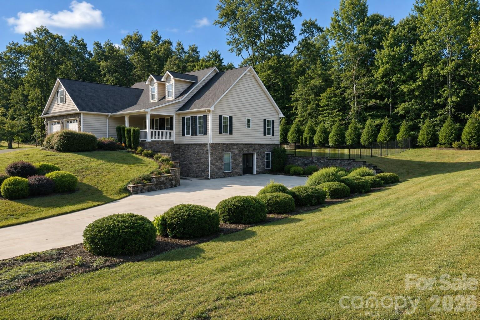 Welcome to the desirable Wittenburg Springs community, where this stunning 3,664 square foot home offers the perfect balance of privacy and neighborhood living. Featuring 3 bedrooms, 3 full bathrooms, and a fully finished basement, this home is thoughtfully designed for both comfort and functionality.

The spacious primary suite is conveniently located on the main level and features a beautifully renovated bathroom complete with a luxurious walk in shower and a separate soaking tub. The kitchen is equipped with quality appliances, including a Viking microwave, GE Profile range, and GE Profile refrigerator, making it ideal for everyday living and entertaining.

The freshly renovated basement boasts brand new luxury vinyl flooring and offers exceptional versatility with a full second kitchen, an additional room that can be used as an office, guest room, or flex space, and plenty of room for recreation. Built with a Superior Walls precast concrete foundation, the basement provides added durability and peace of mind. Additional upgrades include a radon mitigation system and a Rinnai tankless water heater.

Step outside to enjoy your own private retreat. The fenced backyard is surrounded by mature trees that have been strategically planted to enhance privacy. Relax on the screened in deck or gather with family and friends around the patio fire pit. As an added bonus, this property includes an additional parcel of land beside the home, offering extra space and future possibilities. 

The Wittenburg Springs neighborhood offers quick access to downtown Hickory as well as Lake Hickory. Enjoy your time on the water being conveniently located to Wittenburg Access Area which features a boat ramp, swim beach, fishing pier, and nature trail.