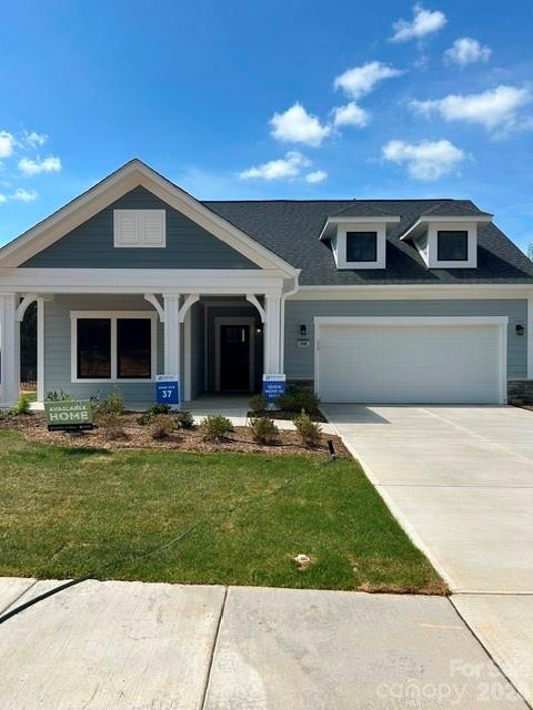 Inventory home - Epcon Communities is proud to celebrate our 40th anniversary this month! To celebrate we are offering our biggest promotion for a very limited time where this home is $40,000 off the original list price! (List price showcases current promotion). If you have been waiting for prices to go down now is your opportunity to start your next best chapter! This luxury ranch home features the expertly curated Portico floor plan. Spacious owner's suite, large closet, bright second bedroom, den with glass doors and a gorgeous private courtyard. Our homes are designed to make your life easier and more enjoyable. The Courtyards at Hodges Farm has quick roadway access to nearby I-485 and I-85. Located near UNC Charlotte and University Research Park. The majority of the homes back up to a mature tree line or green open space. This quick move in home will be available in February 2026