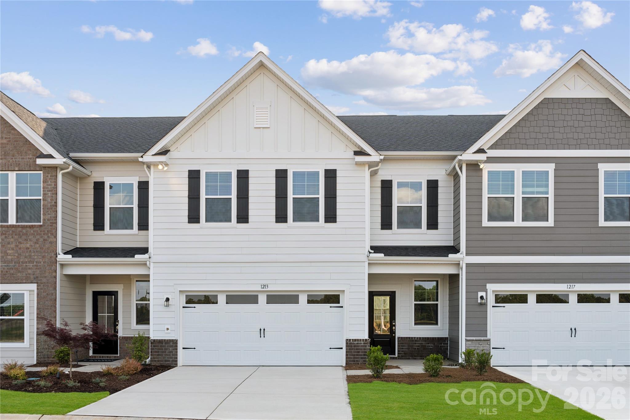 Welcome home to this stunning townhome in Fort Mill, offering 2,448 sq. ft. of beautifully designed living space with the perfect blend of comfort and style. Located just off Interstate 77, this community provides convenient access to Kingsley, historic downtown Fort Mill, and some of the area’s best shopping, restaurants, and entertainment.

Step inside to discover a bright, modern interior featuring upgraded cabinetry, gorgeous quartz countertops throughout the kitchen and baths, and oak stair treads that add an elevated designer touch.

Designed with everyday living in mind, this spacious home includes 3 bedrooms, 2.5 bathrooms, an upstairs flex space, and a tucked-away pocket office on the main level—perfect for working from home or added versatility. Unwind on the covered rear porch and enjoy the convenience of a large 2-car garage, all while experiencing the ease of low-maintenance townhome living with the feel of a single-family home. Schedule your tour today!