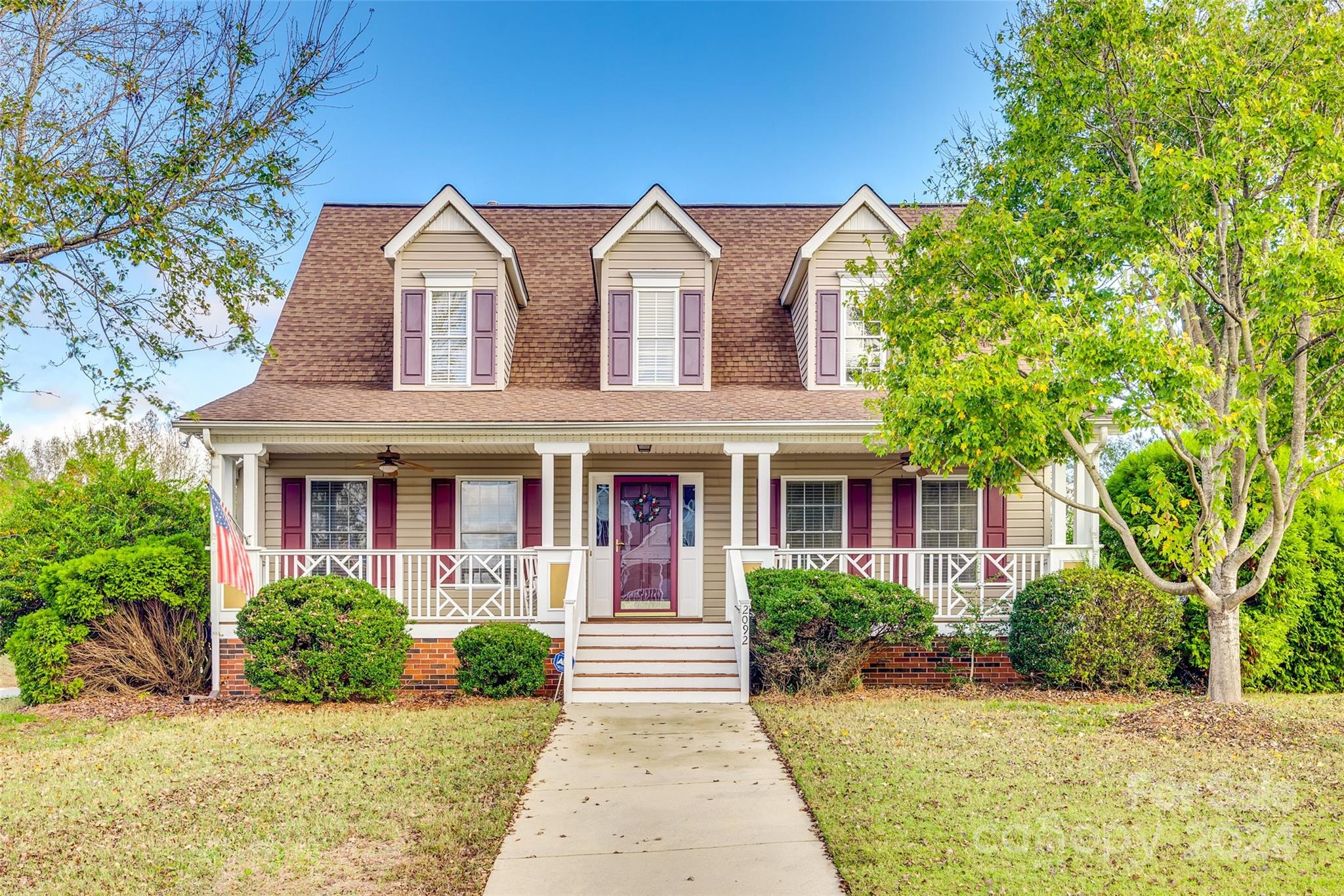 This home in Rollingwood subdivision off of Mt. Gallant road is a must see!  2092 Persimmon has a huge front porch, sits beautifully on a corner lot and has a screened breezeway, a beautifully landscaped backyard deck and patio.  Inside, you will find a large open kitchen and a two story living area.  The primary bedroom has two closets and the primary bathroom has a large jacuzzi tub.  Upstairs, there are two bedrooms, a full bathroom and lots of storage.  A special feature is the fully floored attic space accessible through the two-car garage. This house has all the makings of a beautiful home, ready for some new owners.  The subdivision is conveniently located to I-77 and all that Rock Hill has to offer.