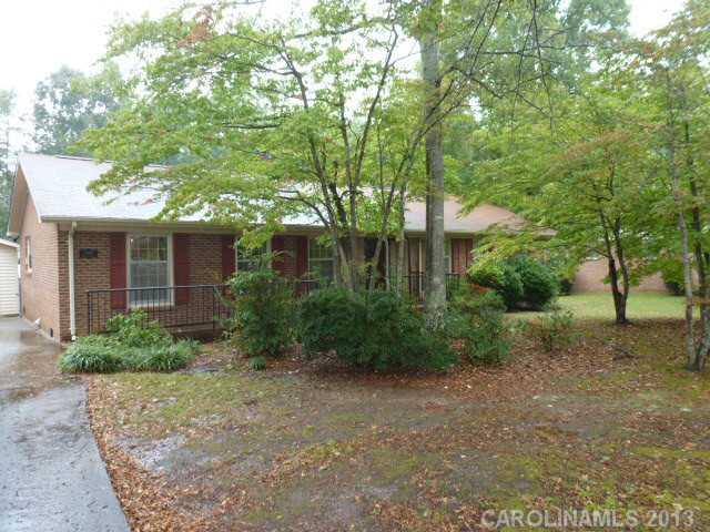 Great price great home with lots of potential. This home is to be sold as is. With a little TLC it will make a great home for the family. This home comes with  fenced in yard, double detached garage shop. This ranch home is all brick handicap accessible. You have 3 bedrooms, 2 baths, living room, dining, kitchen and breakfast area, and den with fireplace.