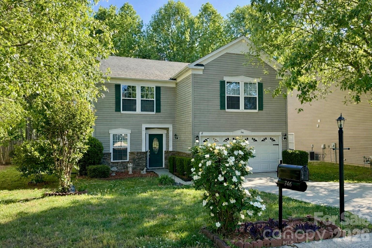 Beautifully maintained and thoughtfully designed, this 3-bedroom, 2.5-bath home blends comfort, functionality, and style. Inside, you’ll find a neutral color palette and spacious open living areas ideal for everyday living and effortless entertaining.
The kitchen is the heart of the home, featuring updated stainless steel appliances, a glass mosaic tile backsplash, tile flooring, and durable Corian countertops. It flows seamlessly into the main living spaces, creating a warm and inviting atmosphere for gathering with family and friends.

Upstairs, a versatile second-floor living area is perfect for a media room, gaming space, or flex area to fit your needs.  Additionally you will find the large primary suite offering a private ensuite bath and generous closet space along with two additional bedrooms that are roomy and well-appointed. 

Can we say outdoor living?!? Step outside to a fenced, tree-lined backyard offering privacy and seclusion.  There you will find a 10x12 covered concrete area and a separate 10x10 grilling patio — both ideal for entertaining. The home and grounds are beautifully illuminated with custom landscape lighting.  Additional features include two storage buildings and a whole-yard irrigation system. Property line extends beyond the fence into the trees for added privacy. 

Neighborhood amenities include a community park, walking trails, and even a dog park... and more to come!

Schedule your private showing today — this one truly has it all.