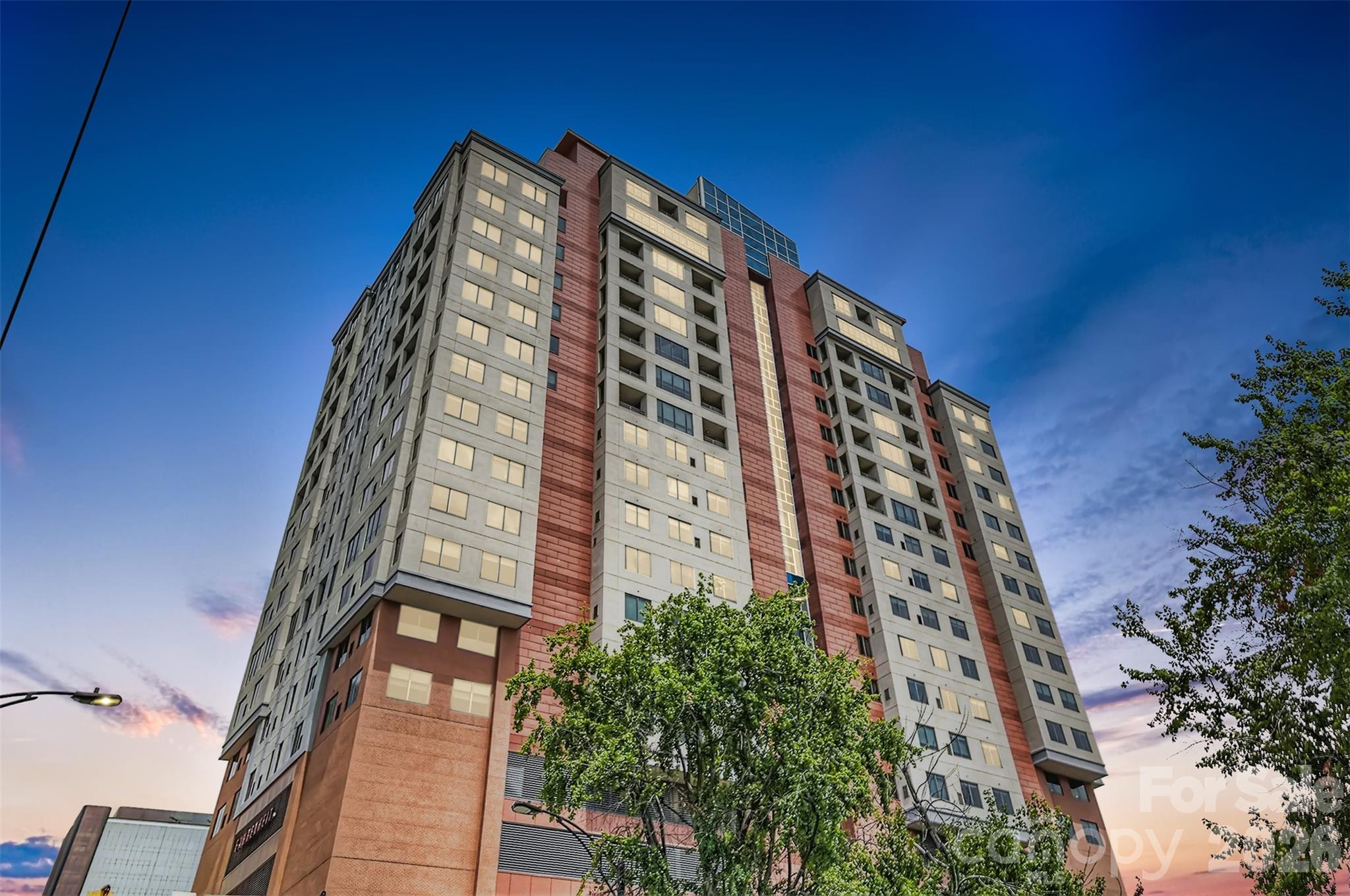 Positioned on the 15th floor, Unit 1501 delivers one of SKYE's largest and most sought-after floorplans and was among the first layouts to sell out when the building originally launched.

Many Uptown buyers discover that while views and amenities are easy to find, truly livable space is much harder to come by. At nearly 1,800 square feet, this residence offers a level of scale rarely found at this price point with generous gathering spaces, natural separation between rooms, abundant storage, and a full-size laundry room.

Walls of glass flood the home with natural light while the open layout creates a sense of volume and flexibility often missing from smaller urban floorplans. The kitchen anchors the space with a large gathering island, gas cooking, stainless steel appliances, and seamless connection to the main living areas.

What truly separates this residence is the dual-terrace layout. One terrace extends directly from the living area, creating additional entertaining space, while the second sits privately off the primary suite, offering a true retreat above the city.

The spacious primary suite features dual vanities, walk-in shower, jetted tub, and oversized walk-in closet. Secondary bedroom offers flexibility for guests, office space, or both.

SKYE amenities include concierge service, fitness center, theater room, club spaces, valet trash service seven days a week, attached hotel accommodations, Google Fiber, EV charging, and Fahrenheit rooftop restaurant. Concerts, sporting events, parks, restaurants, nightlife, and the Uptown Farmers Market are all just outside your door.  AND the HOA fees cover nearly all monthly expenses, including HVAC, gas, and water. 

Most buildings offer a place to live.

This one offers room to stay.