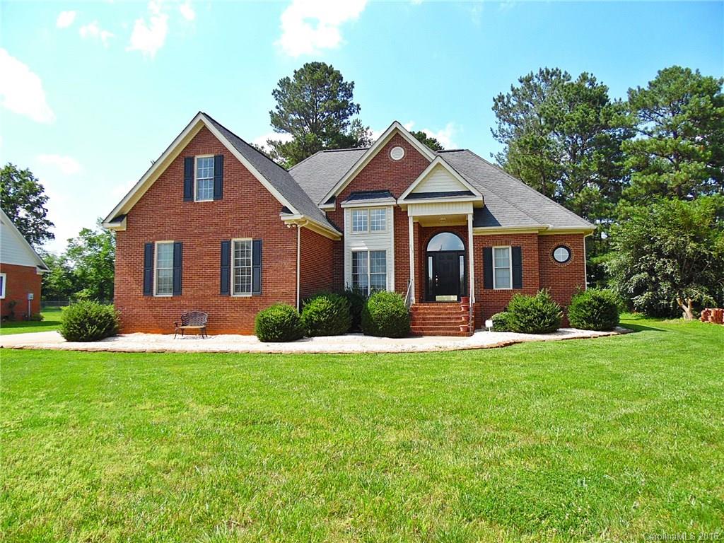 Beautiful full brick home on over a half acre!  Inviting floor plan features stately 2-story dining room perfect for entertaining, gorgeous hardwoods, master on main with tray ceilings, family room with fireplace, and spacious kitchen with tile backsplash.  Upstairs has office, den, and rec room - plenty of space for you to customize to suit your needs!  Relax under the stars in the hot tub on the large deck.  County taxes!