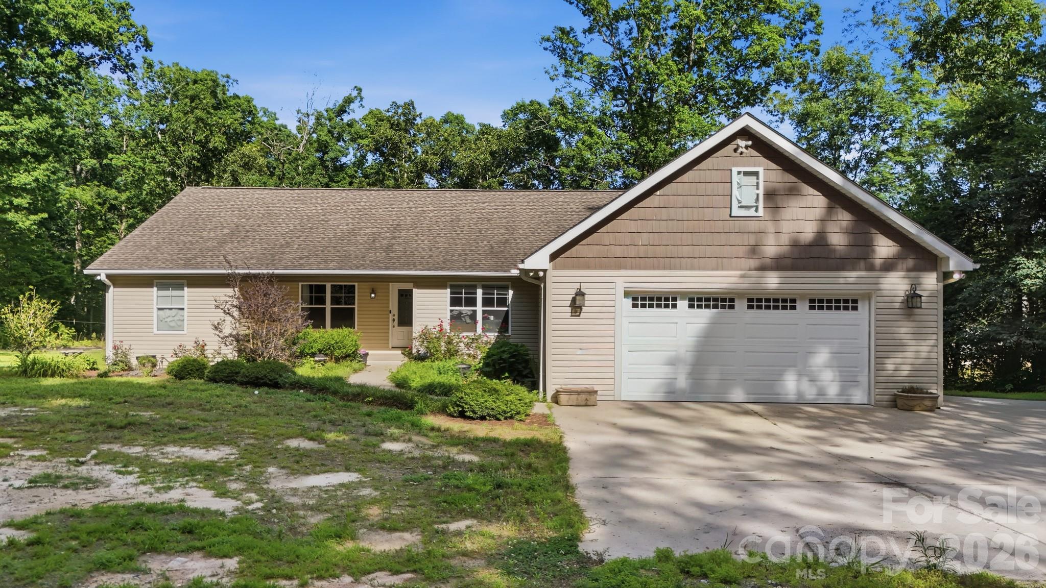 From the moment you turn down the drive, you'll feel it — this isn't just a house, it's a retreat. Set on 3.5 unrestricted, wooded acres just minutes from downtown Lincolnton and Hwy 321, this custom home was built for people who appreciate the details. A large covered porch welcomes you before you even step inside. The open kitchen is designed to impress, with professional-series appliances, dual sinks, full-size side-by-side refrigerator and freezer, and a stunning 9'+ solid-slab granite breakfast bar. Hand-scraped oak hardwoods, custom tile and granite bathrooms, and a luxurious primary shower with double heads complete the picture inside. Four bedrooms, a flex room, finished bonus space above the garage, RV hookup, and an oversized garage give you flexibility for whatever life brings next — with plenty of room left over for a pool or shop.