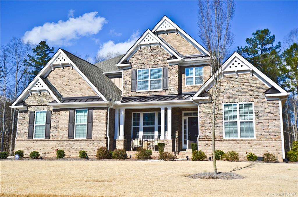 BEAUTIFUL 5BR/4BA Open Concept home fully loaded with features galore!!  Gourmet kitchen has a huge island with tons of cabinet space, double oven, gas cooktop and granite countertops.  Relax with a cup of coffee next to the fireplace in the spacious keeping room.  Hardwoods throughout the first floor, including master.  Amazing craftsman trim package.  2-story great room, full secondary bedroom with bath on main.  Fenced backyard with large deck!  This home has it all!!