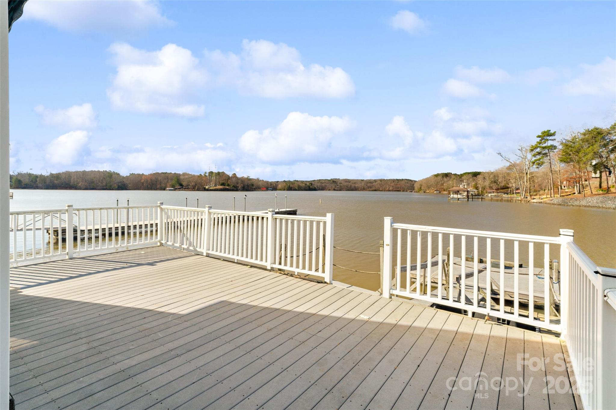 A CASH ONLY offering and what can only be described as perfection in bare necessities of Lake Life! Whether this will be your weekend getaway from the hustle of the big city life or you've been searching for that piece of everyday solitude. Now is your chance! 3Bedroom/2full bathroom! Two story great room and dock gaze right down the main channel! Yes it could use updating & will definitely require structural repairs! Where else are you going to find a property offering so much for so little in todays market? So roll up your sleeves and update this property for what a basic lake front lot should cost! Wildlife Club of Gaston County, with security gate, beautiful club house, private boat ramp, boat storage lot, etc. Just minutes to Belmont & incredible restaurants. Property requires cash buyer as you are buying the home & the club owns all land! No deed! Ownership is dependent on private clubs approval and $1100 annual HOA/lease fee! Water/garbage included. Septic update 2024!