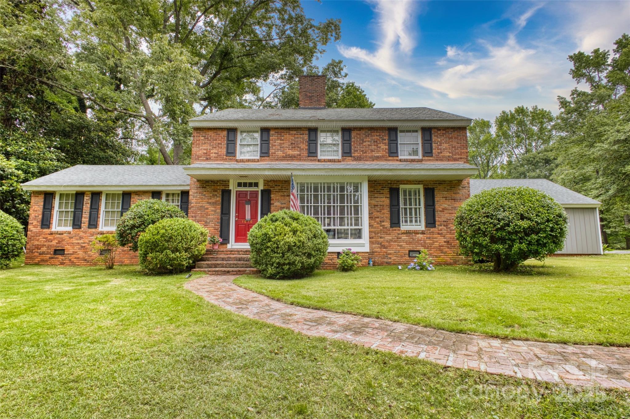 **SELLER OFFERING $10,000 CREDIT TO BUYER'S CLOSING COSTS/PRE-PAIDS** Welcome to this charming home blending timeless elegance with modern comfort. Nestled in the Forest Hills neighborhood, this spacious home features a formal living room with a stately bay window, a den with hardwood floors, and 2 centrally located fireplaces that service both sides of the home. The kitchen has been newly updated with stainless steel appliances and flows into a dining area with a full wall of windows. 5 bedrooms offer flexibility, with the primary suite being on the main level. Original details like crown molding and TONS of built-ins add to this home's character. Enjoy the backyard patio with gatherings made possible by the quality craftsmanship of yesteryear. Located near downtown Lancaster, it offers suburban charm with urban access. This colonial gem is ready for its next chapter. Schedule a tour today to explore its warmth, charm, and potential!