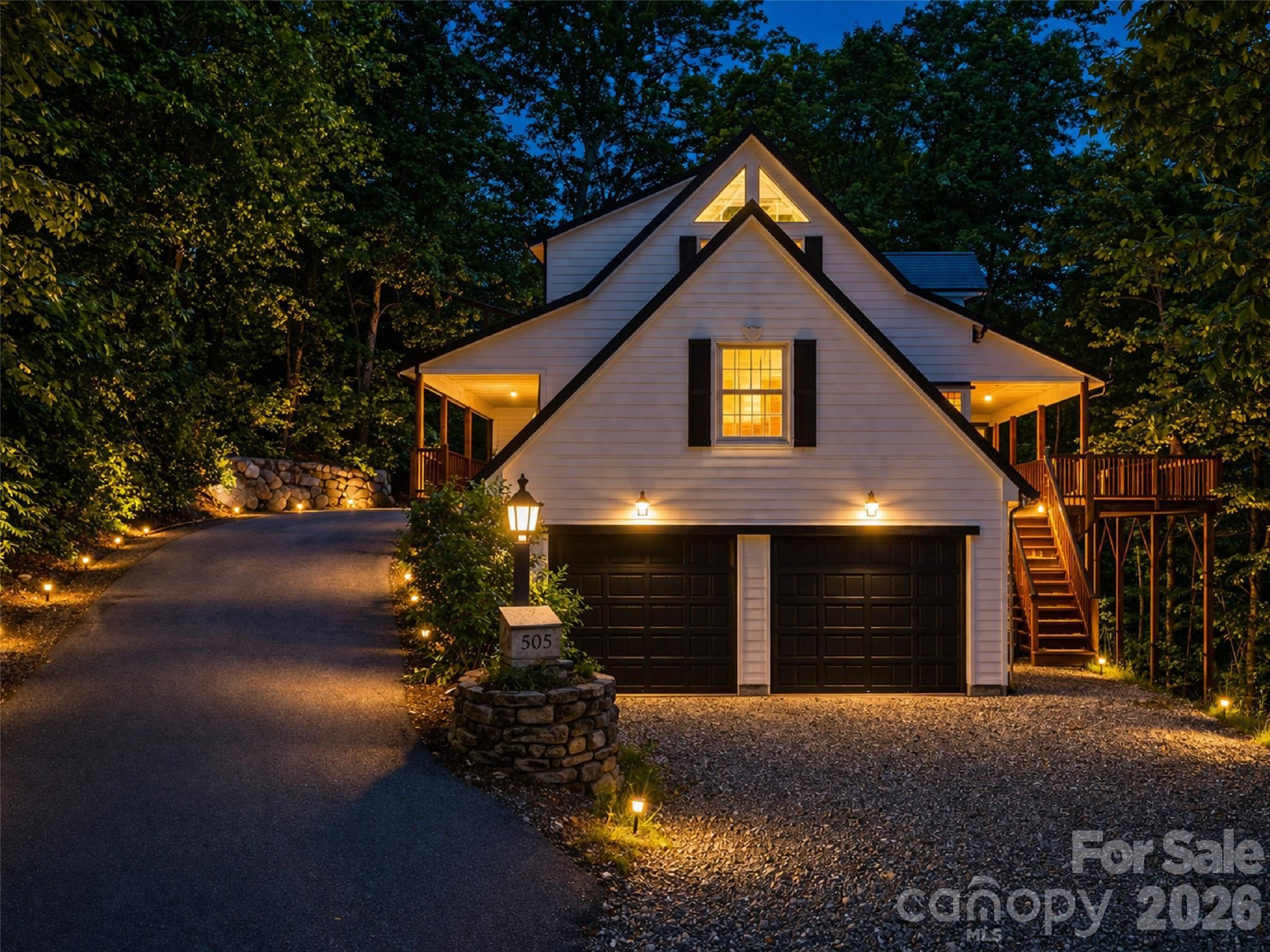 Perched above Maggie Valley at over 5,000 feet, this exceptional mountain retreat captures breathtaking long-range views, refined comfort, and effortless year-round living just minutes from town. Set within the sought-after Laurel Heights community, this home offers a rare combination of elevation, privacy, and accessibility—where layered mountain vistas stretch endlessly from nearly every vantage point. The main level welcomes you with a vaulted great room featuring warm wood ceilings, a stone fireplace, and expansive windows that frame the surrounding landscape. Designed for both relaxation and entertaining, the open-concept layout flows seamlessly into a well-appointed kitchen and dining area, all positioned to take full advantage of the views. Step outside to the covered deck—an ideal setting for morning coffee, sunset dinners, or simply taking in the cool mountain air and ever-changing scenery. The spacious primary suite offers a peaceful retreat, complete with an en-suite bath and private outlook over the mountains. Additional guest rooms and flexible living spaces provide comfort for family and visitors, while the lower level offers versatility for recreation, media, or potential rental use. Recent updates enhance both style and peace of mind, including a new architectural shingle roof, skylights, and exterior improvements completed in 2024. Whether you’re seeking a luxury mountain getaway, full-time residence, or income-producing investment, this property delivers on every level—with proximity to the Blue Ridge Parkway, Waynesville, Asheville, and year-round outdoor activities. A rare opportunity to own a true Smoky Mountain retreat with views, comfort, and convenience in perfect balance.
