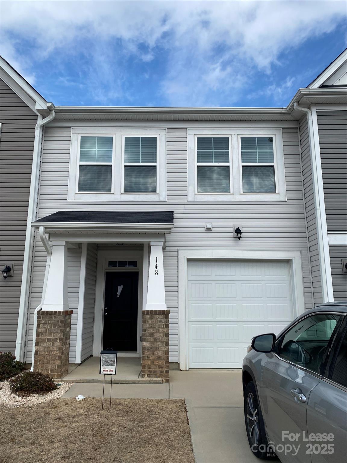 This charming 3-bedroom, 2.5-bath townhome in the desirable Poplin Glen community is a true gem. Built in 2021, it boasts a spacious open floor plan with stylish vinyl plank flooring on the main level and soft carpeting upstairs. The beautiful kitchen features a large island, perfect for cooking and entertaining. Step outside to your own private backyard with a cozy patio, ideal for outdoor living. With a one-car garage, washer and dryer included, and a prime location near shopping, dining, and major roads, this home offers both comfort and convenience in a welcoming neighborhood.