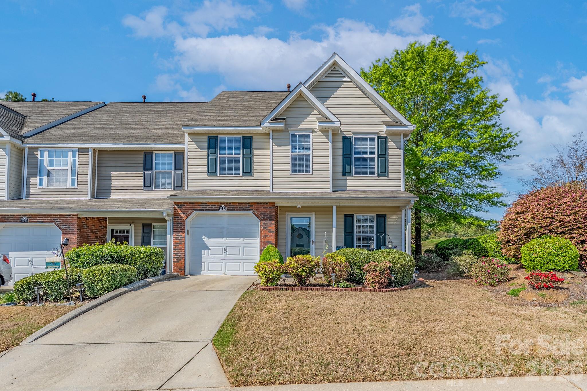 This one-owner end unit townhome has been well-loved and maintained – making it a rare find!  Featuring the primary bedroom suite with private bath on the main level, this home is move-in ready.  The open floor plan of the kitchen, dining area, and family room enhances your entertainment space.  The living area of the main floor features newer plank flooring, providing warmth and coziness to this home.  The upstairs will provide great space for owners or guests with two bedrooms, a second full bath, and loft.  A special addition to this home is the screened porch on the back where you can enjoy your morning coffee or relax at the end of a busy day.  A single garage is going to be an asset on those rainy days and also provides storage space.  Enjoy the convenience of being in close proximity to the community pool as well as within close distance to I-77, shopping, and restaurants.  You do not want to miss the opportunity to this see this one!
