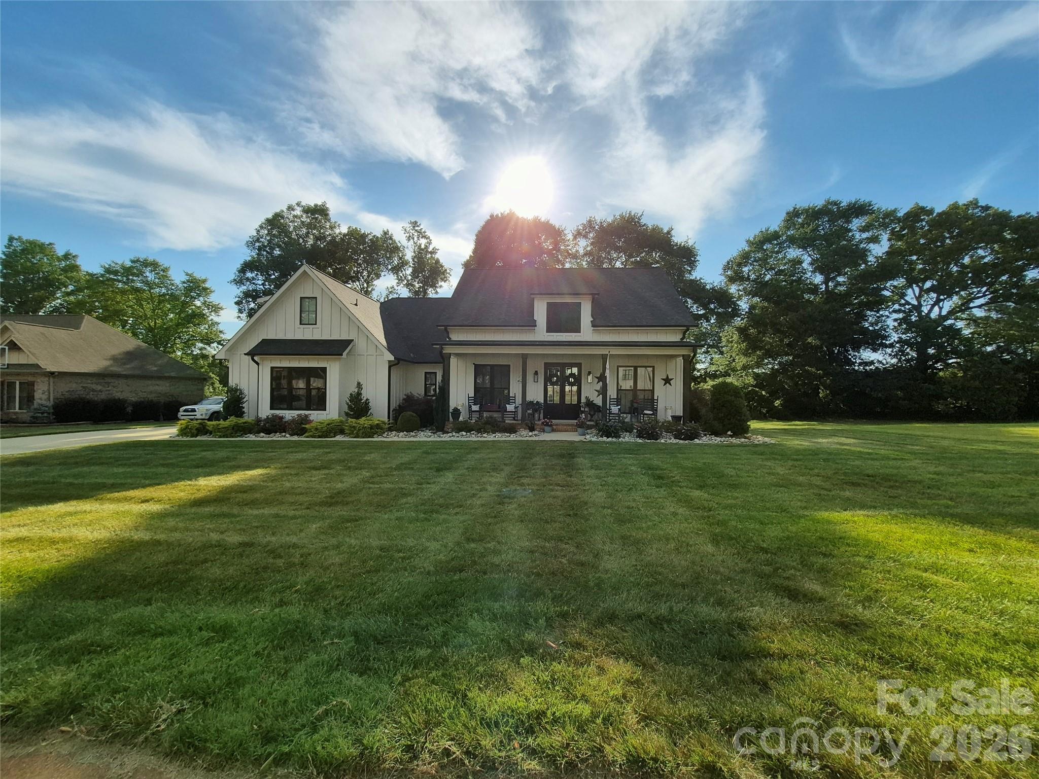 Welcome to this exceptional custom-built home in the highly desirable Cline Farm community! Built in 2021, this beautifully designed home offers over 2,700 square feet of thoughtfully planned living space with quality craftsmanship and timeless finishes throughout. Step inside to an inviting open floor plan featuring beautiful hardwood floors, quartz countertops, a spacious center island, abundant cabinetry, and tile bathrooms. The split-bedroom design provides privacy, while the expansive bonus room with a full bath offers incredible flexibility as a guest suite, home office, media room, or recreation space. Perfectly positioned on one of the neighborhood's most desirable lots, this home offers peaceful pond views, beautiful landscaping, and outstanding curb appeal. Enjoy your morning coffee on the welcoming covered front porch or unwind on the covered back porch overlooking the scenic setting. The spacious primary suite offers a relaxing retreat, while the home's thoughtful layout provides comfortable everyday living as well as an ideal space for entertaining family and friends. Every detail reflects pride of ownership and attention to quality. Residents of Cline Farm enjoy access to neighborhood amenities, including a community pool and clubhouse, along with protective covenants that help preserve the beauty and value of the community. Located in desirable Western Lincoln County, this home combines the tranquility of country-style living with the convenience of nearby shopping, dining, schools, and major highways. If you've been searching for a move-in-ready home that offers quality, comfort, and a picturesque setting, this is one you won't want to miss! MLS#4400423 $715,000