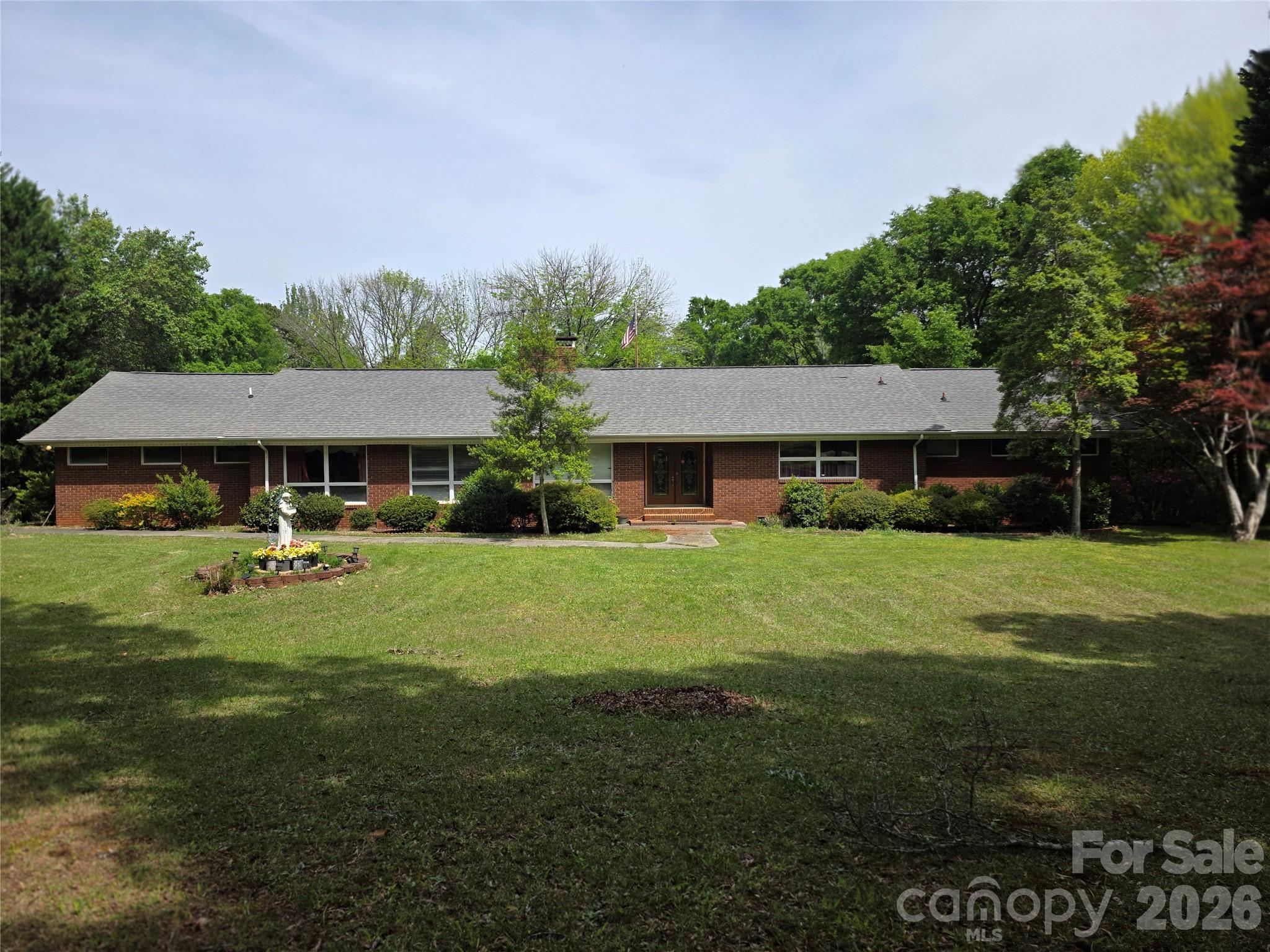 Large brick home situated on +/-5 acres of land in Mecklenburg county. 
Opportunity awaits...up to your imagination.