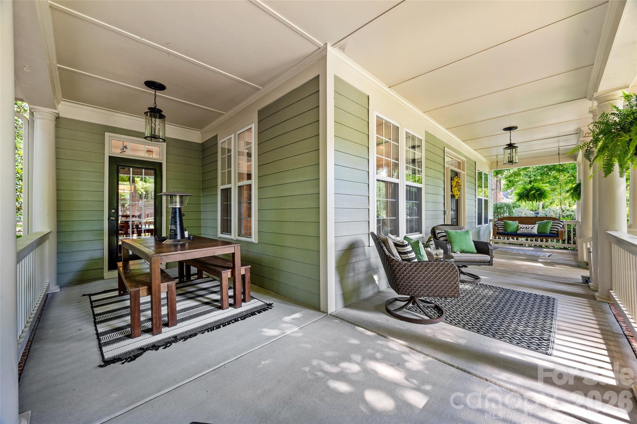 This one is a show stopper located in one of Lake Wylie's most desired neighborhoods, known as The Landing.  This two-story home sits on a private wooded lot with tons of updates.  The wrap-around front porch is wonderful for relaxing with a great book or simply enjoying your morning coffee.  The owners really enjoy having dinner on the side porch, which is adjacent to the kitchen area, especially on Spring and Fall evenings when the Carolina weather is so beautiful. On the main level, you will enjoy nice hardwood floors, a formal dining room, a home office with built-ins, a living room, an open family room to the kitchen, and a breakfast sitting area.  Updated kitchen with SS appliances, bar seating, walk-in pantry, and granite countertops. The upper level has a very spacious primary bedroom with a walk-in closet, an updated bathroom with a soaking tub and a separate shower.  There are also three additional bedrooms and two additional full baths, a loft/playroom, flex space and the laundry room. Backyard is private, shaded with wonderful trees surrounding the paver patio, great for entertaining family and friends.  Nice level yard is amazing for the kids and pets to play.  Oversized three-car garage and ample driveway parking!  Come enjoy award-winning Clover schools, low SC taxes, easy commutes to Charlotte International Airport, Uptown Charlotte, and hospitals.  Hop on your golf cart and visit grocery stores, restaurants, and fitness facilities. Community pool, walking trails, and kayak access to Lake Wylie. This home will be assigned to the new Lake Wylie High School less than 6 miles away!