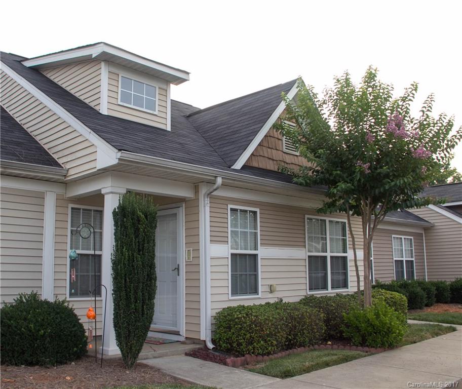 HURRY, WON"T LAST!  This Beautiful move-in ready home is in a Quiet town home community in the heart of Lake Wylie! New Paint throughout the home with Master bedroom tucked away upstairs! Home comes w/ refrigerator, microwave, stove, dishwasher, washer, dryer & intercom system that can be connected to your music. Great location near community pool fitness facility, restaurants, grocery & convenience store, post office. Award winning Clover school District.