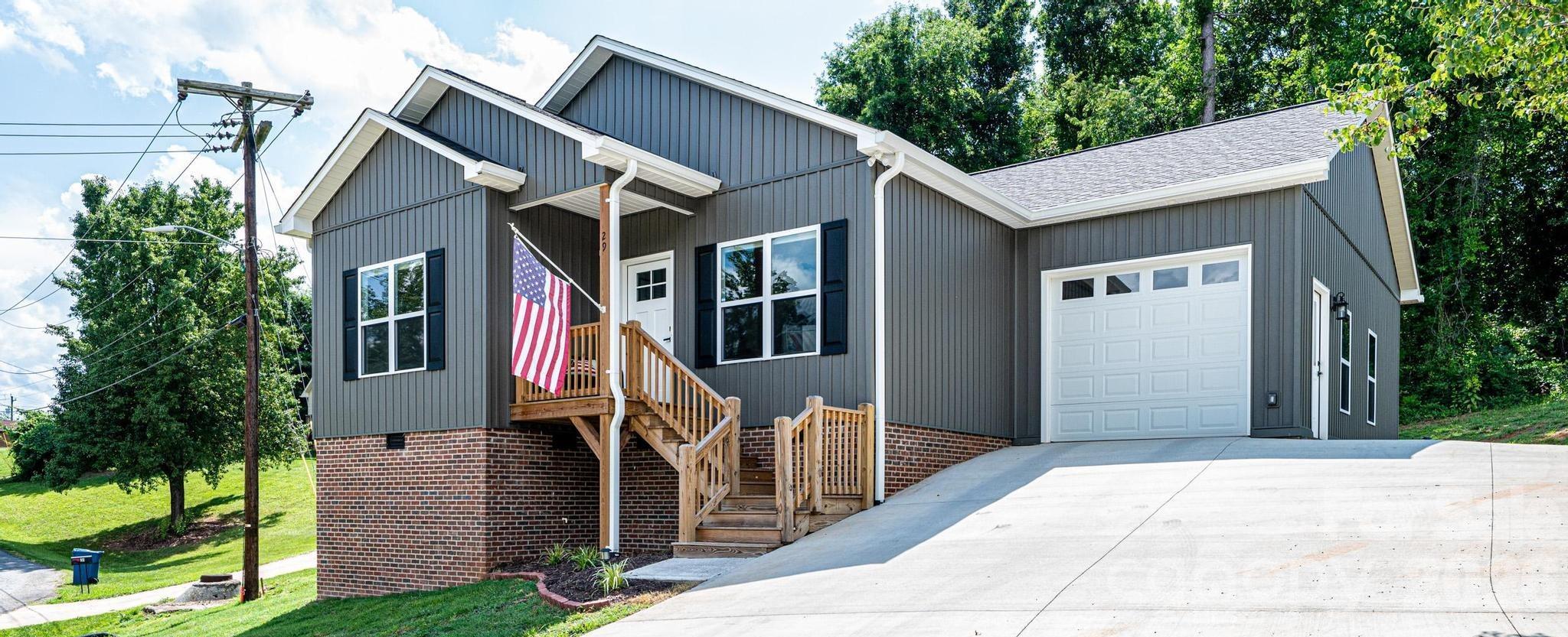 **LIKE-NEW CONSTRUCTION IN THE HEART OF GRANITE FALLS!** Welcome to 29 Central Street, where modern finishes, low-maintenance living, and small-town charm come together in one exceptional package. Why wait months for new construction when you can move right into this beautifully completed 3-bedroom, 2-bath home that offers the look, feel, and efficiency of a brand-new build?

From the moment you arrive, you'll appreciate the attractive curb appeal and inviting exterior that set the tone for what's inside. Step through the front door and discover a bright, open-concept floor plan designed for today's lifestyle. Natural light fills the living spaces, creating a warm and welcoming atmosphere that's perfect for both everyday living and entertaining.

The spacious living room flows seamlessly into the kitchen and dining area, making it easy to stay connected with family and guests. The kitchen serves as the heart of the home and features stylish cabinetry, modern finishes, ample counter space, and a layout that makes meal preparation both convenient and enjoyable. Whether you're hosting friends, preparing holiday meals, or enjoying a quiet evening at home, this space is designed to meet your needs.

The primary suite offers a private retreat with a well-appointed en-suite bath and generous closet space. Two additional bedrooms provide flexibility for family members, guests, a home office, nursery, or hobby room. The second full bath is thoughtfully designed with modern fixtures and finishes to complement the home's overall style.

Built with today's buyer in mind, this home offers the benefits of newer construction including modern systems, energy efficiency, updated materials, and the peace of mind that comes with a move-in-ready property. Neutral finishes throughout provide the perfect backdrop for any decorating style, allowing you to easily make the space your own.

Outside, you'll find room to relax, entertain, and enjoy North Carolina's beautiful seasons. Whether you're sipping coffee in the morning, grilling with friends, or simply unwinding after a long day, the outdoor space offers plenty of possibilities while remaining easy to maintain.

Location is another standout feature. Situated in the heart of Granite Falls, you'll enjoy convenient access to local shopping, dining, schools, parks, and everyday amenities. Commuters will appreciate the quick drive to Hickory, Lenoir, and US-321, making travel throughout the region simple and convenient. Enjoy the charm of a growing community while remaining close to everything you need.

Perfect for first-time buyers, downsizers, investors, or anyone seeking a turnkey property, 29 Central Street delivers the rare combination of modern construction, stylish finishes, and an affordable opportunity in today's market. Homes with this level of quality, condition, and value don't come along often.

If you've been searching for a home that checks all the boxes—move-in ready, like-new condition, functional floor plan, and convenient location—your search ends here. Schedule your private showing today and experience everything this beautiful Granite Falls home has to offer. **Like-new construction, modern comfort, and small-town convenience await at 29 Central Street!
