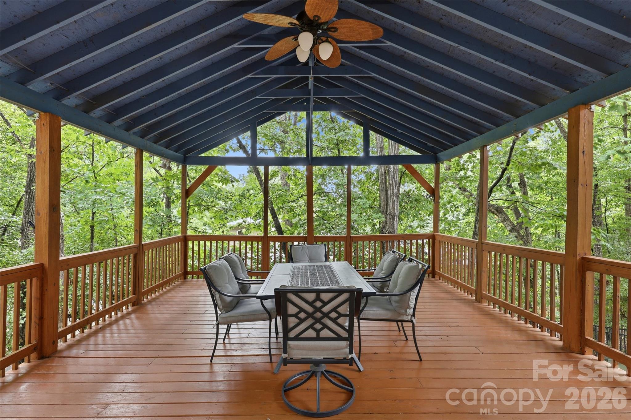 Life in Tega Cay just hits differently. This beautifully maintained 1,788-square-foot residence perfectly captures that easygoing lakeside energy, offering a blend of classic charm and modern comfort. Tucked away with peaceful views of Lake Wylie, this home is designed for anyone who appreciates a view and a slower pace of life.

Inside, the two-level layout feels both spacious and cozy. Luxury vinyl plank flooring runs through the main living areas, but the real showstoppers are the two floor-to-ceiling wood-burning stone fireplaces. They add a sense of soul and character to the home that you just don't find in newer builds. With three bedrooms and two full baths, there is plenty of room to spread out, while the multiple living areas offer great flexibility for hosting or relaxing.

The heartbeat of this home, however, is the sprawling covered back porch. It’s a true year-round outdoor retreat where you can watch the light hit Lake Wylie or enjoy the breeze through the trees. It’s the kind of spot where coffee tastes better in the morning and the evenings feel a little longer.

Living in Tega Cay means having a resort-style lifestyle right outside your front door. The community is packed with amenities, including miles of scenic trails, a sparkling pool, tennis and pickleball courts, and 27 holes of championship golf. With easy lake access and plenty of parks, the outdoor options are endless. Plus, you’re perfectly positioned for a quick commute to Fort Mill, Rock Hill, or Charlotte. Known for its strong academic reputation, this home offers an exceptional combination of outstanding schools and a vibrant lakefront atmosphere.  This isn’t just a house; it’s your chance to plug into one of the most vibrant lake communities in the region.