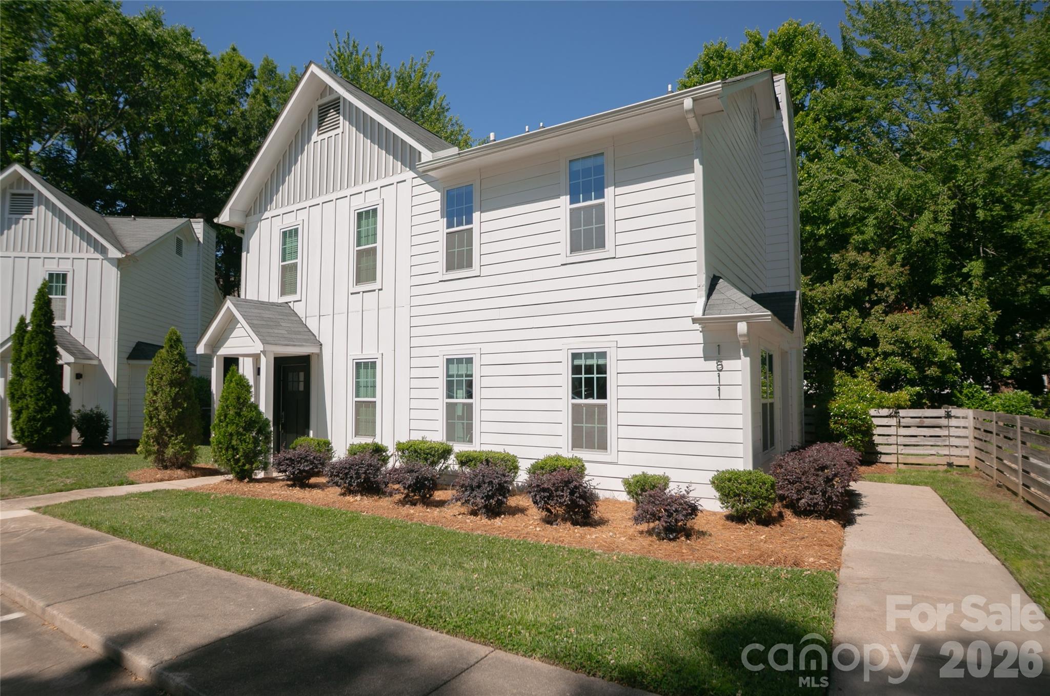 Beautifully updated and exceptionally maintained, welcome to 1511 #B Briar Creek Road in the desirable Midwood Place townhome community. Ideally located just minutes from Plaza Midwood, Elizabeth, Uptown, and South End, this 2-bedroom, 2.5-bath townhome offers stylish, low-maintenance living with easy access to Independence Boulevard for convenient commuting throughout Charlotte.
Designed with thoughtful upgrades throughout, this light-filled home features an open floor plan with Shaw LVP flooring on both levels, recessed kitchen lighting, fresh interior paint, and spacious living and dining areas centered around a cozy fireplace feature. The updated kitchen showcases sleek cabinetry, quartz countertops, stainless steel appliances, bar seating, upgraded Delta faucet, glass rinser, and a high-quality quiet garbage disposal. French doors open to a private patio and fenced backyard with newly added grass, creating the perfect outdoor retreat.
Upstairs, both bedrooms feature ensuite baths, including a spacious primary suite with a walk-in closet and upgraded glass shower enclosure. Additional highlights include nest thermostat, roller shades throughout, room-darkening shades in the bedrooms, fan prewiring in both bedrooms, and expansive attic storage exclusive to this unit — a rare feature within the community. Major updates completed in 2019 include the roof, HVAC, windows, siding, flooring, and fence. Samsung washer and dryer also convey.
Assigned parking spaces plus guest parking add everyday convenience, while the prime location places you close to some of Charlotte’s best restaurants, breweries, coffee shops, shopping, and entertainment. Turnkey and move-in ready, this is an exceptional opportunity in one of Charlotte’s most connected neighborhoods. Plus up to $10,000 in closing cost assistance available with the preferred lender, this is an incredible opportunity in a central, fast-growing location. Reach out with any questions!