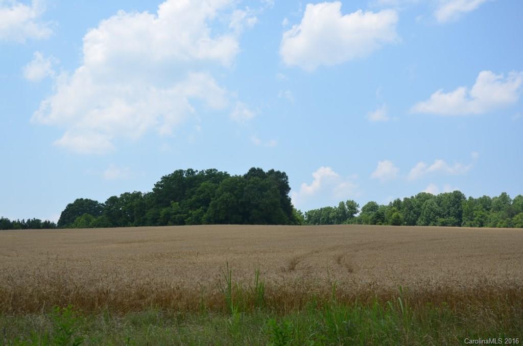 Nice piece of land off of Hwy 70 has been rezoned commercial but could be used for residential. Currently has crops on property. Good road frontage.