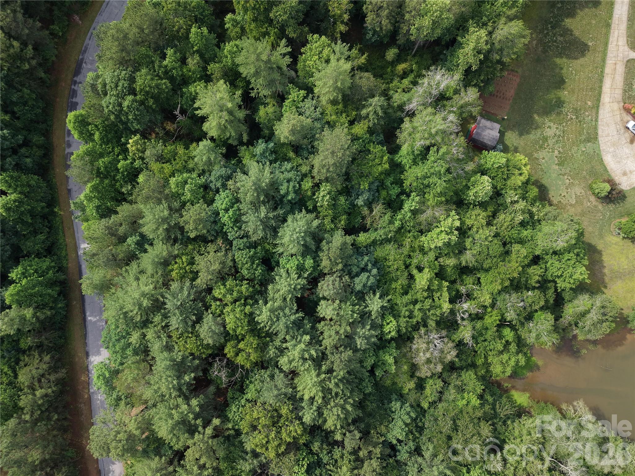 Two adjacent wooded lots available together in the Crystal Falls subdivision near Lake Hickory — 0.53 acres and 0.69 acres combining for over 1.2 acres of buildable land in Caldwell County. Both parcels offer wooded views, foot access to Lake Hickory, and 304 ft of road frontage on a paved publicly maintained road. County water available, no city taxes, and surrounded by established homes in a quiet, established neighborhood. Septic needed. A rare chance to secure over an acre of lakeside land in one of the most scenic corridors north of Hickory — build your dream home with room to breathe or hold as a long-term investment near the water.

Equitable interest / assignment of contract. Seller does not hold title. Sale subject to underlying agreement. Buyer to perform due diligence. Contact listing agent for details.