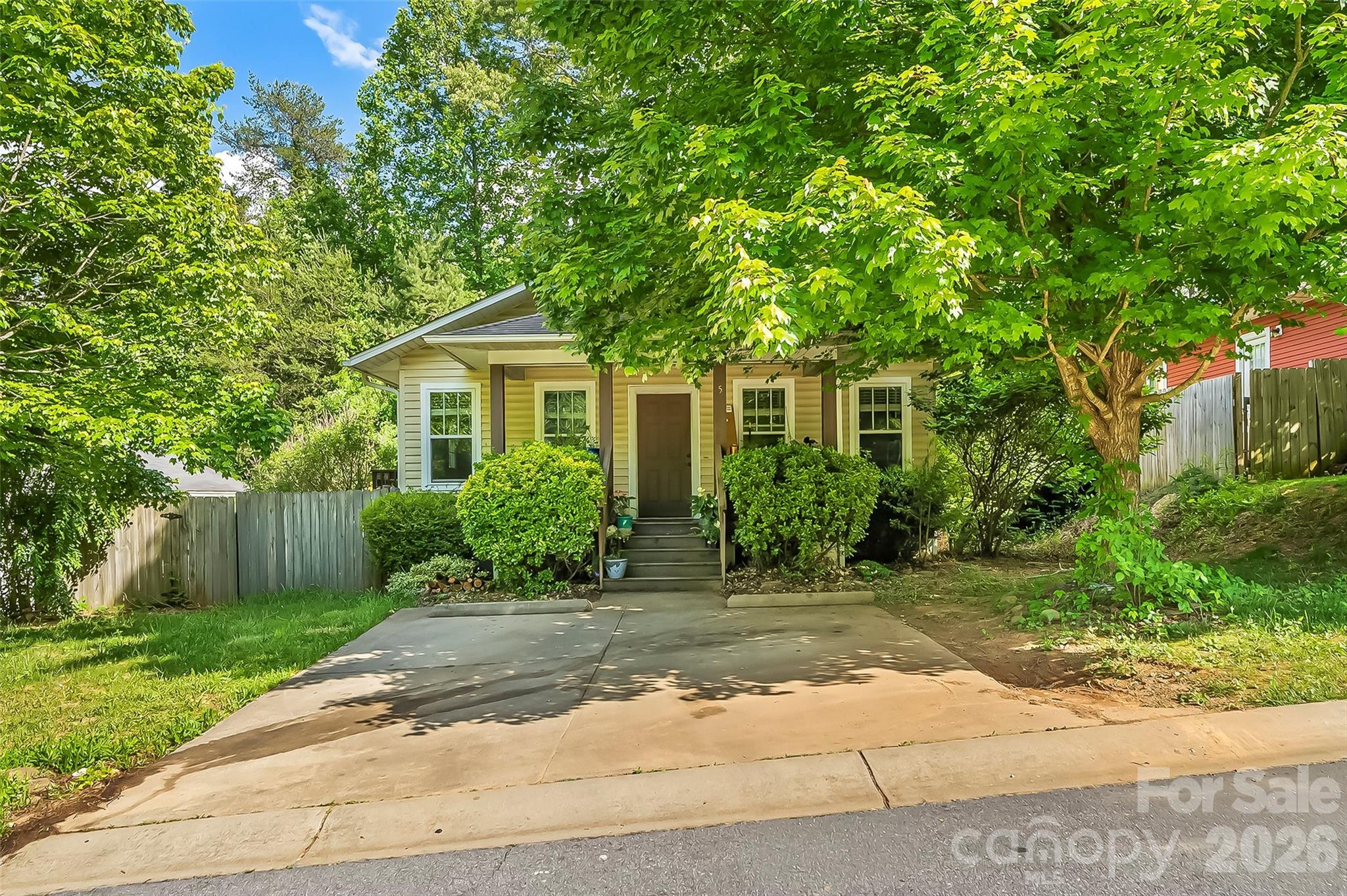 Don’t miss this sweet West Asheville bungalow offering the perfect blend of charm, convenience, and value! Featuring 3 bedrooms, 1.5 baths, and a level 0.15-acre lot with a fenced backyard, this home offers just the right amount of outdoor space to enjoy without the hassle of heavy maintenance. Inside, you’ll appreciate the sensible floor plan with the kitchen, living, and dining areas welcoming you at the front of the home, while the bedrooms are tucked privately toward the back. Located in a coveted area close to all the eclectic dining, shopping, and energy West Asheville is known for, this property has also been a successful rental—making it an excellent opportunity for both homeowners and investors alike. Amazing price, unbeatable location, and endless potential! Tenant-occupied until late June 2026. Please do not disturb tenant.