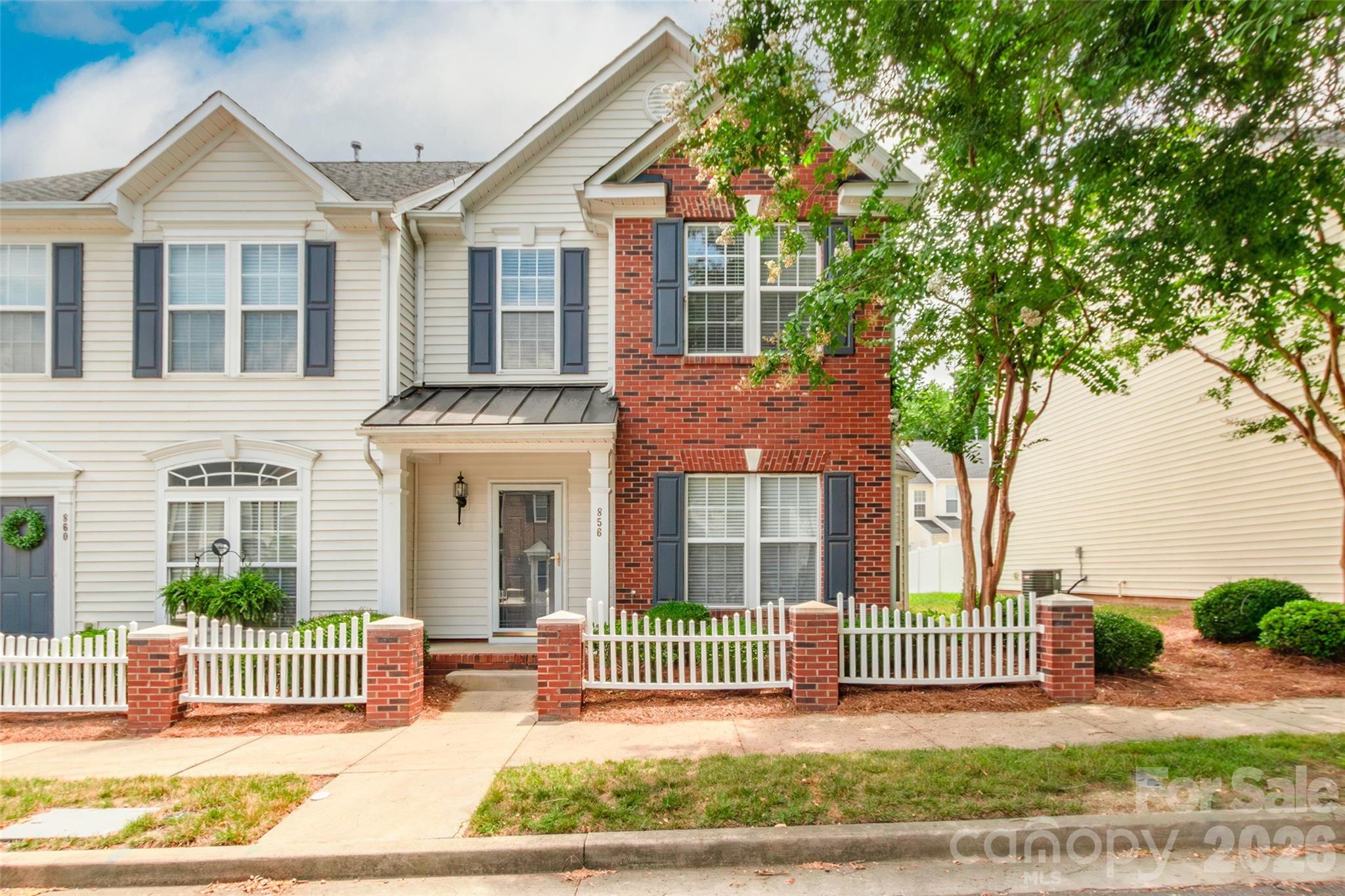 Enjoy low-maintenance living in this well-located 2-bedroom, 2.5-bath townhome, conveniently situated near shopping, dining, and everyday conveniences. The functional floor plan features two spacious bedrooms, each with its own private bath, while the additional half bath on the main level is perfect for guests. Relax outdoors on the inviting porches, offering the perfect spot for morning coffee or evening unwinding. Whether you're a first-time homebuyer, downsizing, or looking for an investment opportunity, this centrally located townhome is one you won't want to miss! And no need to worry about the troublesome pipes present in the community as this unit had interior pipes replaced in 2025 as well as newer HVAC. Move in ready for you!!