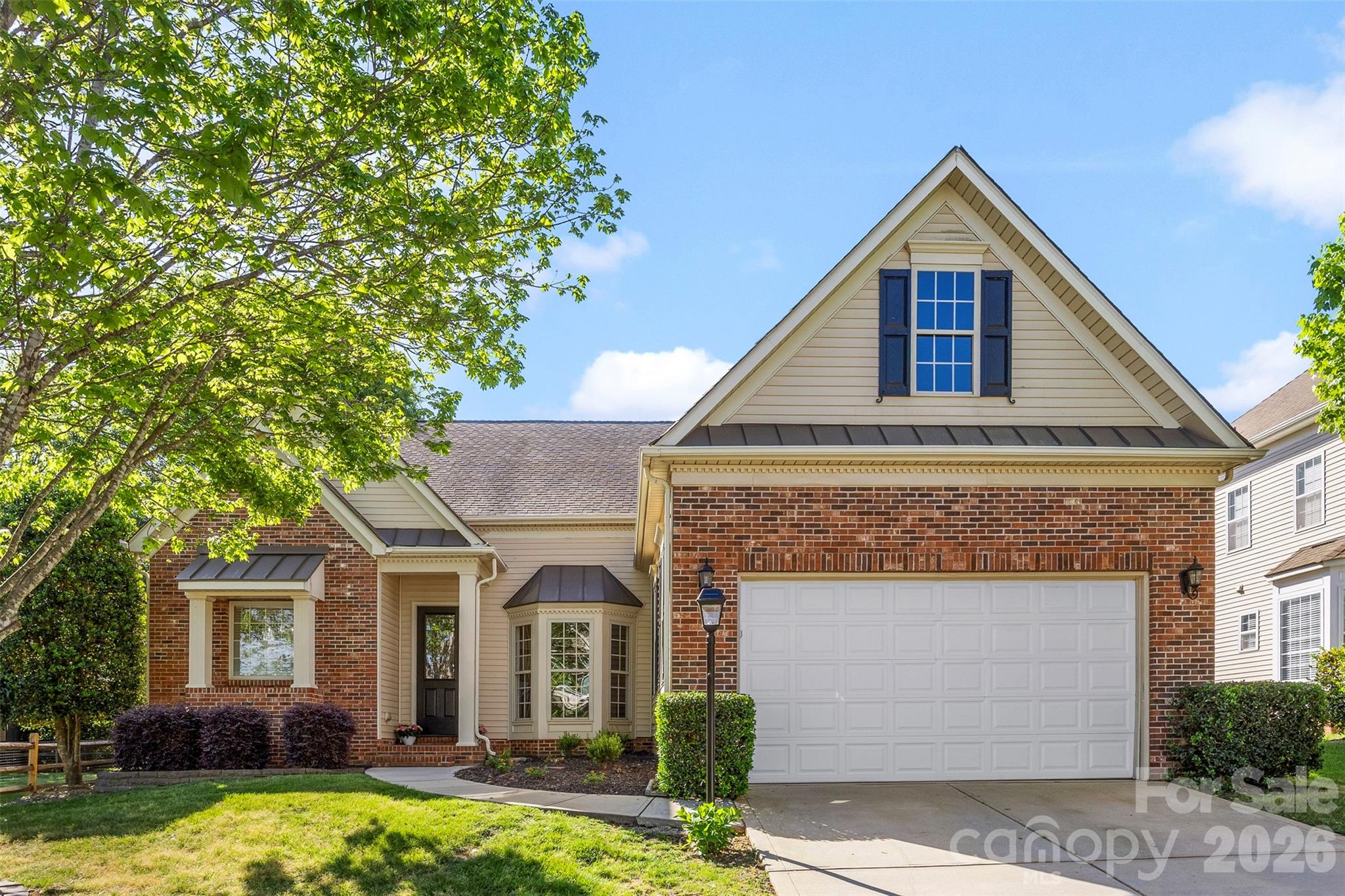 Great 1.5 story layout with primary plus 2 bedrooms on the main floor.  Architectural details such as crown molding, rounded corners, and tall ceilings, and 8 foot doors make this home feel very custom and add so much character.  Large patio in the back with lots of greenery making for a private space for relaxing, grilling, or catching a game of corn hole! Cuthbertson school district and convenience to shopping and quaint downtown Waxhaw make this a true gem.  New carpet and paint! Ask Listing Agent about potential assumable loan options!