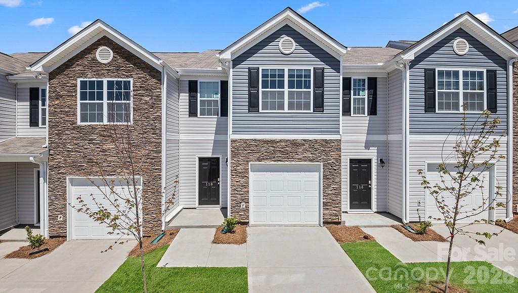 The Newton is an open concept plan with living in mind. This home offers three bedrooms, two & a half bathrooms & a one-car garage. Upon entering the home, you’ll be greeted by an inviting foyer that leads directly into the heart of the home. This impressive space features a living room, dining room, & a well-appointed kitchen. The kitchen is equipped with a pantry, stainless steel appliances, & a pass through from the kitchen to dining room, making it perfect for both cooking and casual dining. The Newton features a luxurious primary suite, complete with a large walk-in closet and en suite bathroom with dual vanities. The additional two bedrooms provide comfort and privacy and share a full bathroom. Out back is a large patio, perfect for outdoor entertaining or enjoying beautiful weather.