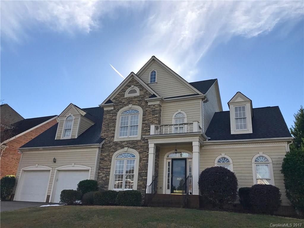 Move in to this highly sought after neighborhood & enjoy the details of this home. Kitchen with granite counters, center island, gas cooktop, SS double door refrigerator.  Open to a 2 story great room with lots of natural light. Fireplace with gas logs.  Formal dining room. Hardwoods. New carpet.  Master on main w/custom closet. Upper  level has 2 bedrooms and spacious bonus/4th bedroom. Fenced landscaped yard w/over sized patio and stack stone wall. Minutes to shopping and restaurants.
