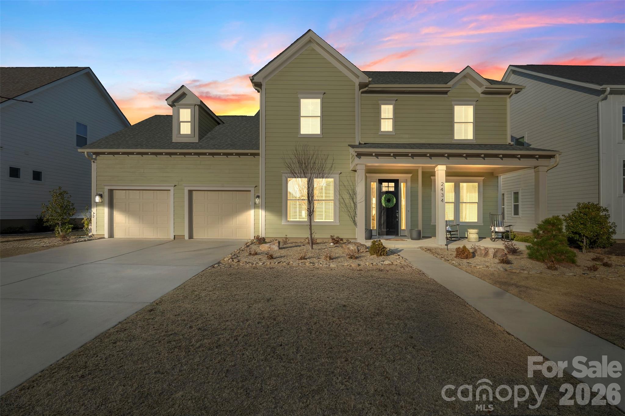 Elegant 4BR home with bonus room/bedroom and private office featuring French doors in the prestigious Paddlers Cove community. This beautifully appointed residence offers an open main level with luxury vinyl flooring, formal dining room with french doors, and an expansive great room with fireplace, ideal for refined entertaining and everyday comfort. The chef-inspired kitchen showcases quartz countertops, an oversized island, gas range with hood vent, and microwave. An oversized main-level laundry with storage, drop zone, and half bath add effortless convenience. Outdoor living is elevated with a covered back patio featuring a stone fireplace, extended patio, and fenced yard. The upper level offers four generously sized bedrooms, three full baths, and a versatile bonus room. Finished 2-car garage with parquet-style floor. Enjoy resort-style amenities including pickleball, tennis, outdoor pool, and baseball field. A must-see home offering elevated design, comfort, and lifestyle.