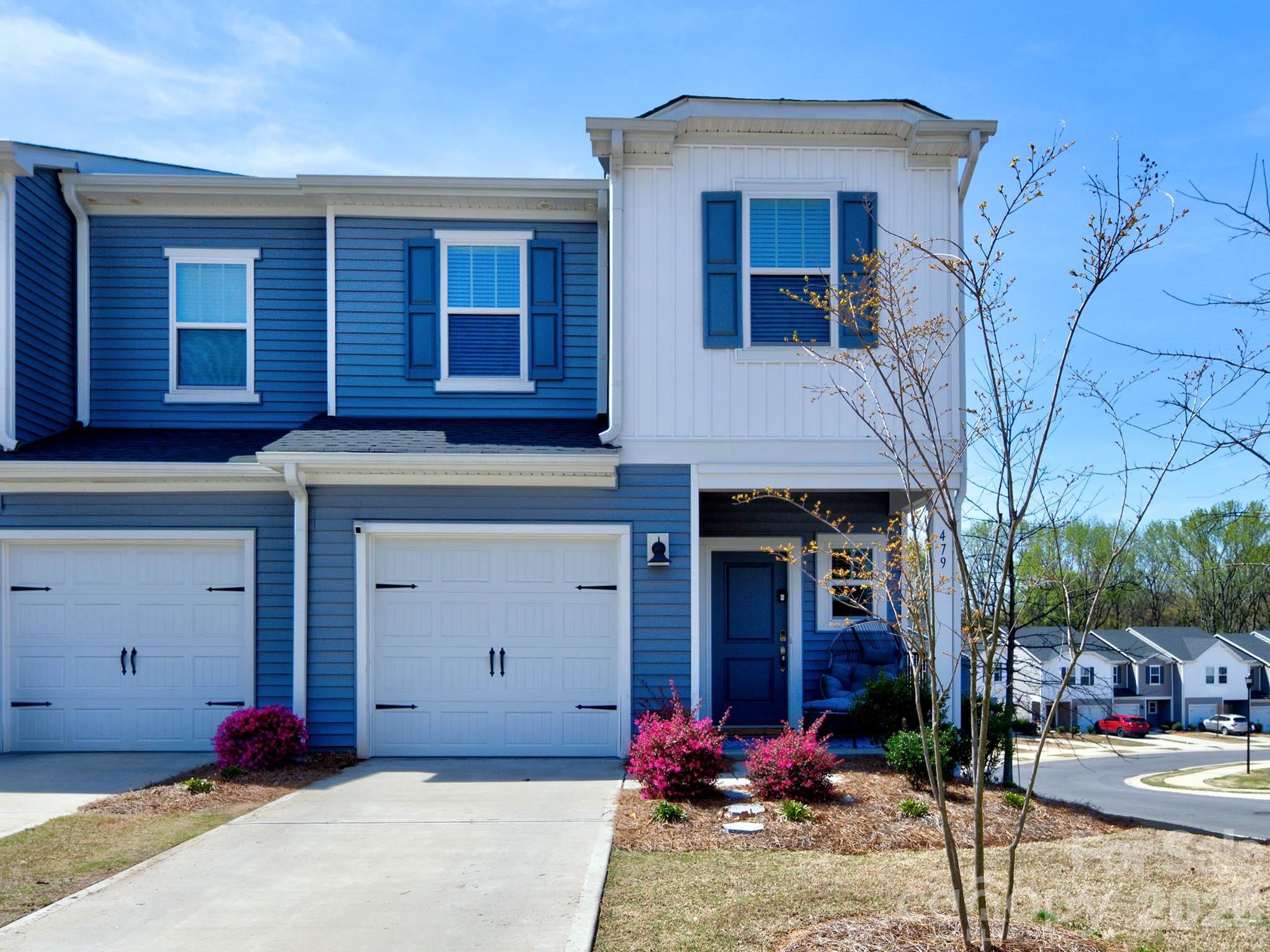 Beautifully maintained 3-bedroom, 2.5-bath end-unit townhouse with a one-car garage, ideally located in the heart of Fort Mill. Step inside through the welcoming foyer featuring a charming drop zone—perfect for everyday organization.  The kitchen is thoughtfully designed with quartz countertops, a stylish tile backsplash, crisp white cabinetry, and stainless steel appliances. It seamlessly opens to the dining area and spacious living room, creating an ideal layout for both entertaining and daily living. Upstairs, you’ll find a generously sized primary suite with a private en-suite bath, along with two additional bedrooms, a full hall bath, and a conveniently located laundry area.
As an end unit, this home is filled with abundant natural light and offers added privacy. The attached one-car garage provides extra convenience and storage. Move-in ready and well-appointed throughout, this home is perfectly situated just minutes from shopping, dining, and major highways—making everyday living easy and accessible.