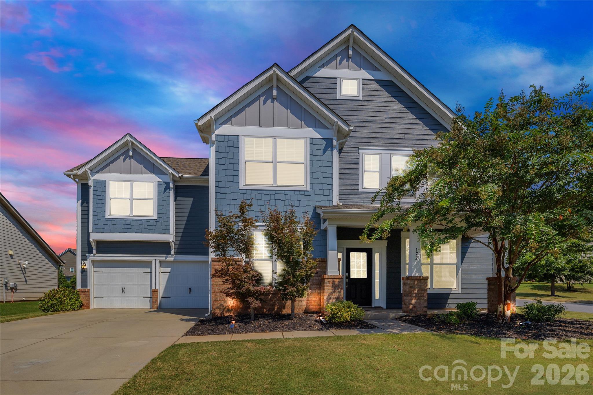 Discover exceptional space and style in this move-in ready Craftsman-style home in The Retreat at Rayfield, one of Indian Land area’s most in-demand neighborhoods. With 3,389 square feet, this residence is designed for growth, gracious entertaining, and everyday comfort. Every detail has been thoughtfully planned to provide a combination of livability and elegance in a vibrant community setting.

The main level flows beautifully for both everyday living and special occasions. At the front of the home, a welcoming room with French doors offers flexibility as a home office, study, or reading space. A large dining room provides the perfect backdrop for holiday gatherings or dinner parties. The well-appointed kitchen is the heart of the home, with a 5-burner gas cooktop, double ovens, stainless steel appliances, deep cabinetry, and a large granite island that offers both storage and seating. This space opens seamlessly into the great room, where a gas log fireplace creates a warm focal point, and into a spacious breakfast area ideal for daily dining and casual entertaining. Wide plank engineered hardwood floors and upgraded pendant lighting enhance the stylish yet comfortable atmosphere.



Upstairs, the serene and spacious owner’s suite provides a private retreat designed for relaxation. The tray ceiling adds architectural detail, while a cozy sitting area with fireplace offers a restful corner at the end of the day. The spa-inspired ensuite bath features dual vanities, a soaking tub, frameless glass shower with tile surround, and a large walk-in closet. Three additional bedrooms are also located upstairs. Two share a Jack & Jill bath with double vanity, and a third is adjacent to a full hall bath. The oversized bonus room provides endless versatility, whether envisioned as a game room, fitness area, creative studio, or media room. The layout adapts effortlessly as your needs evolve.

Outdoor living is equally appealing. A screened porch offers a comfortable place to relax with a book or unwind in the evenings. The expansive paver patio extends entertaining space outdoors, making it easy to enjoy al fresco dining, grilling, entertaining. The fenced backyard provides both privacy and ample room for play. An irrigation system and landscape lighting keep the grounds both lush and inviting.

The home's exterior features low-maintenance Hardie Plank siding, freshly repainted in July 2025, for long-lasting curb appeal. The two-car garage with epoxy flooring and extended driveway provides both functionality and convenience, as well as plenty of room for vehicles and storage. Inside, a "true" laundry room with built-in shelving and cabinets ensures organization. A tankless water heater adds efficiency.

Life at The Retreat at Rayfield extends beyond the home itself. Resort-style community amenities include a clubhouse, pool, fitness center, and playground. These features support an active lifestyle and provide opportunities to connect with neighbors.

Nestled just six miles south of Charlotte’s upscale Ballantyne area, The Retreat at Rayfield offers a convenient location with easy access to schools, retail centers, and commuter routes. Golf enthusiasts will appreciate the proximity of the Carolina Lakes Golf Club (about two miles away).