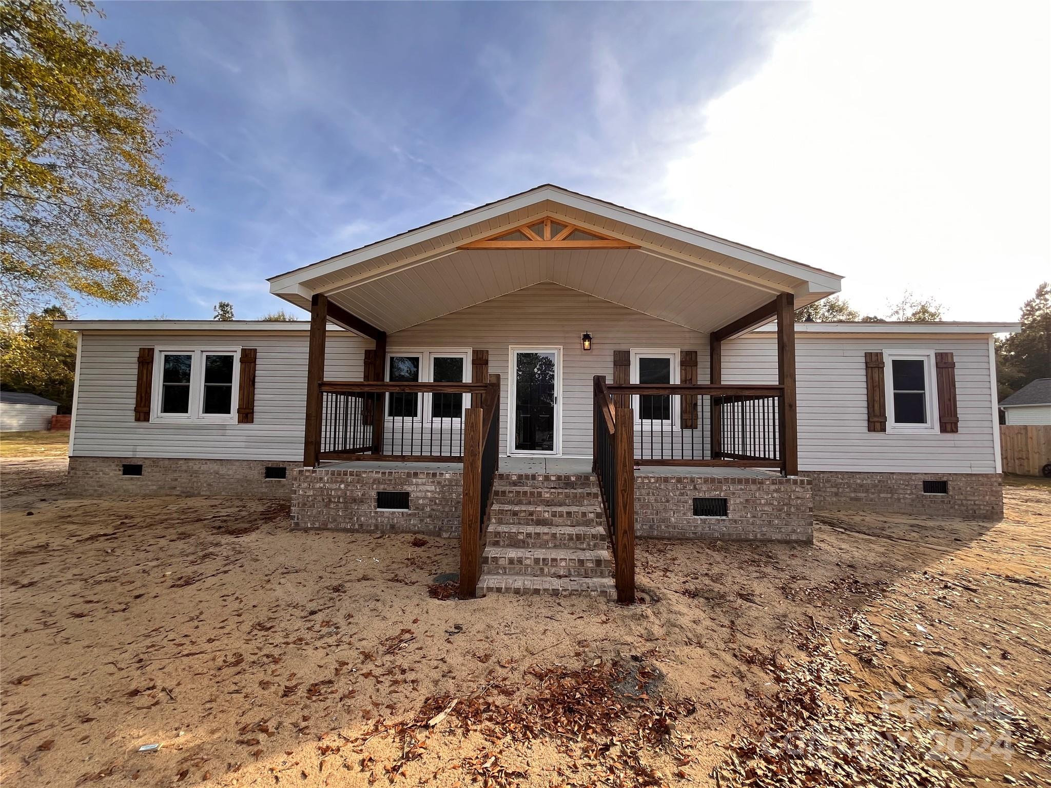 Ready to call this lovely property in PAGELAND, SC home? Look No further, This 1998 manufactured home situated on a spacious lot , offering plenty of potential and room to breath while being conveniently close to the growing town of Pageland. This lovely home offers a cozy, practical layout with plenty of natural light and  all the essentials for easy living. The back yard provides ample room for gardening, outdoor activities, or future improvements, allowing you to shape this property to fit your vision of "home". Don't miss a chance to own versatile property with land to call your own!