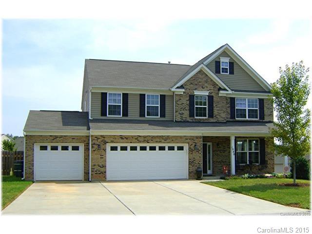 Great open floor plan w/nice features; 3 car garage, brick & vinyl home, fenced yard & low taxes. All for under $300K! Central great room w/columns opens to dining area & kitchen with granite counters, large island, GAS range, recessed lighting & pantry. Upper level has a spacious master bedroom with trey ceiling, deep walk-in closet. The large, private bath has raised dual sink vanity, garden tub & separate shower. 3 other bedrooms share a full bath. Open media/bonus room.  Move-in ready home.