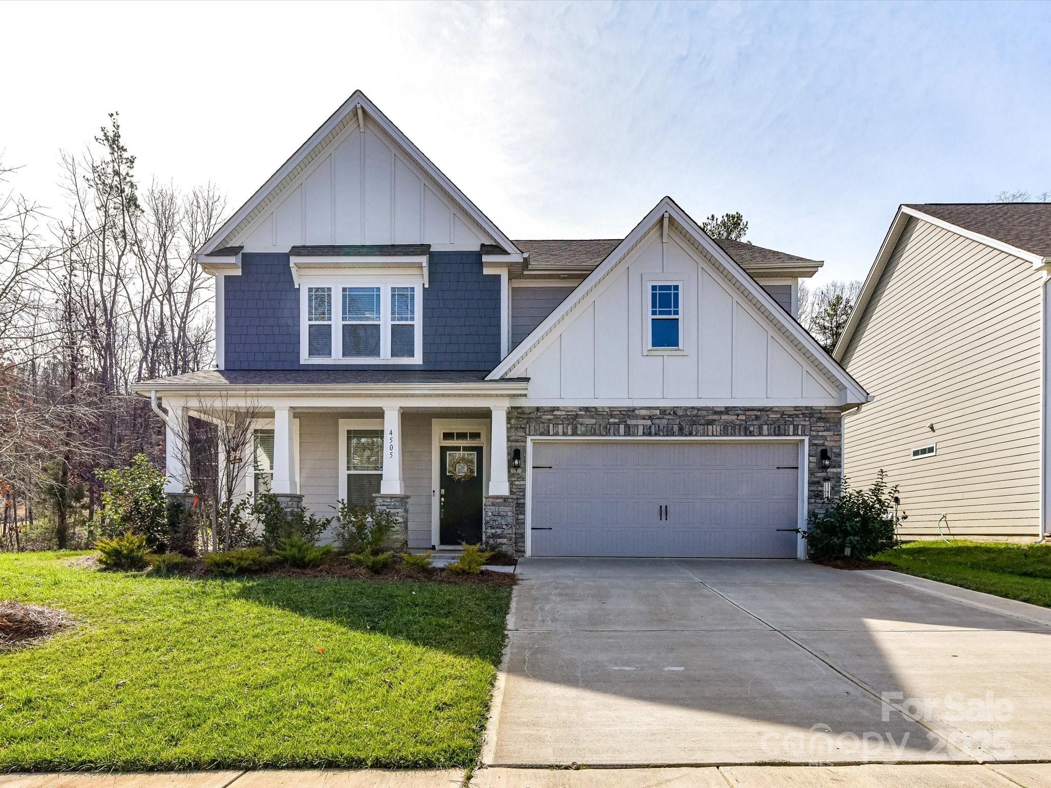 Located in the highly sought area of Avondale, near Ballantyne, this beautiful home features 4 spacious bedrooms, and 3 full bathrooms. Enjoy the convenience of a guest bedroom on the main floor while the primary suite with sitting area and additional bedrooms are privately located upstairs. The home also boasts a versatile loft area and updated kitchen with stylish white cabinets, quartz counters, subway tile and a butler's pantry, perfect for any home chef. Step outside to find a covered patio with an extended stamped concrete patio and walkway. Located on a quiet corner, wooded lot.  You don't want to miss out on this one.