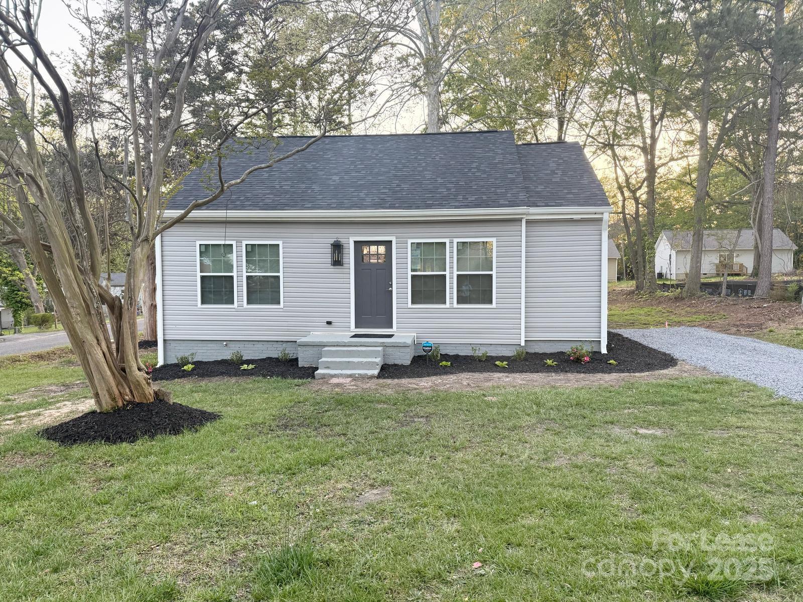 Step into modern comfort with this beautifully custom renovated Cape Cod-style home nestled on a level lot located within city limits and major highways. The redesign includes all brand-new windows, roof, electrical, plumbing, floors and electric fireplace.   
The bright kitchen features high quality cabinets, granite countertops, new stainless-steel appliances with vent hood and ample task lighting that complements the oversized window over the farmhouse style sink. 
The two full size baths have tiled bathtub surrounds and floors along with the spacious laundry room. 
This home is close to the FUSE district and Walmart and offers versatility with the additional living room, bonus room, and large private wood deck that delivers style, blending classic charm with contemporary convenience.
Schedule your tour to see this beautiful home today.