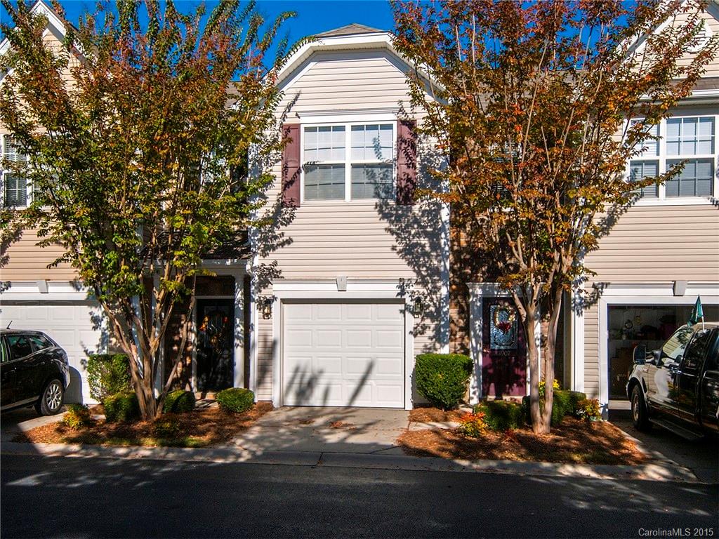 Stunning townhome! This move in ready home is spotless. Prepare meals in the updated kitchen,  that features stainless appliances, granite counter tops and a huge breakfast bar. The wood floors on the first floor are near perfect! Outside,  the patio is enclosed and backs up to trees for added privacy. Two large master bedrooms upstairs with full baths. Plenty of closet space in this home and a great location in Fort Mill. Close to shopping, dining and I77. Great Fort Mill schools and low taxes!