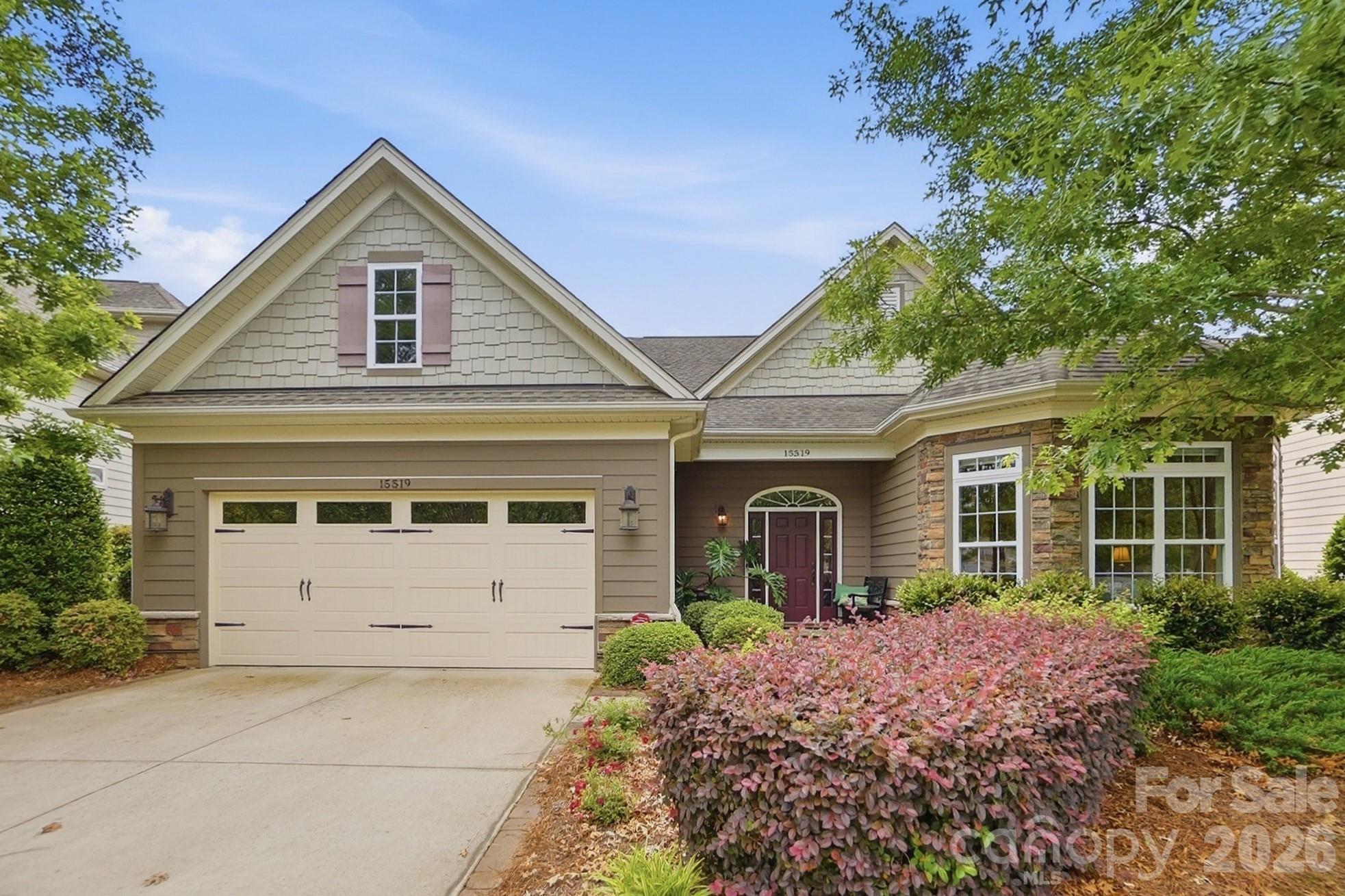 Welcome to 15519 Lake Ridge Road - Regency at The Palisades
Discover the ease of resort-style living in one of the Lake Wylie area's most sought-after communities. Regency at The Palisades offers a maintenance-included lifestyle surrounded by lush landscaping, world-class amenities, and a warm, active neighborhood culture, all just minutes from shopping, dining, and the best of the Charlotte metro.
This impeccably maintained home makes an immediate impression with its charming craftsman-style exterior, stone accents, mature landscaping, and welcoming arched entry. Step inside to a grand foyer featuring rich hardwood floors, elegant tray ceilings, and crown molding that flows seamlessly throughout the main living areas. The open-concept layout is bathed in natural light, with a formal dining room anchored by a designer chandelier opening directly into a spacious great room which includes surround sound, perfect for entertaining or relaxed everyday living.
The chef's kitchen is the heart of the home, offering an abundance of maple cabinetry, gleaming granite countertops, a gas cooktop, double wall ovens, stainless steel appliances, and a large center island with seating for four. A bright breakfast area with oversized windows overlooks the backyard, making every morning meal feel like a retreat.
The generous primary suite features a beautiful tray ceiling, hardwood floors, and a wall of windows framing tranquil green views. The ensuite bath offers a double vanity with granite counters, a walk-in tiled shower with glass enclosure, and a private water closet. Secondary bedrooms are equally well-appointed, with one showcasing stunning bay windows and serene natural light. A cozy flex room with vaulted ceiling provides the perfect space for a sitting room, home office, or media lounge. This home also has a built-in pest control system for maintenance ease.
Step outside to your private brick paver patio, an entertainer's dream with multiple seating areas, a covered section with ceiling fan, lush landscaping, full irrigation, and a beautifully manicured lawn maintained by the HOA. Evenings are illuminated with custom exterior landscape lighting. Whether you're hosting a summer cookout or unwinding at the end of the day, this outdoor space delivers.
Storage is made easier with a floored attic space as well as added storage cabinets and shelving that have been added to the garage. Don't missed the beautiful epoxy flooring finish!
The Regency lifestyle extends well beyond your front door. A full-time activities director keeps the social calendar thriving year-round with clubs, events, and gatherings designed to foster genuine connection. The beautifully appointed clubhouse is the community's social hub, complete with a fitness center, billiards room, reading lounge, and a stunning indoor lap pool with a retractable roof. Outside, a resort-style pool and hot tub invite you to relax in style, while pickleball and tennis courts, bocce ball, and a scenic walking path leading to views of Lake Wylie round out an amenity package that rivals any resort. For those who love the links, Palisades Country Club is just a short golf cart ride away, because here, every day feels like a getaway.