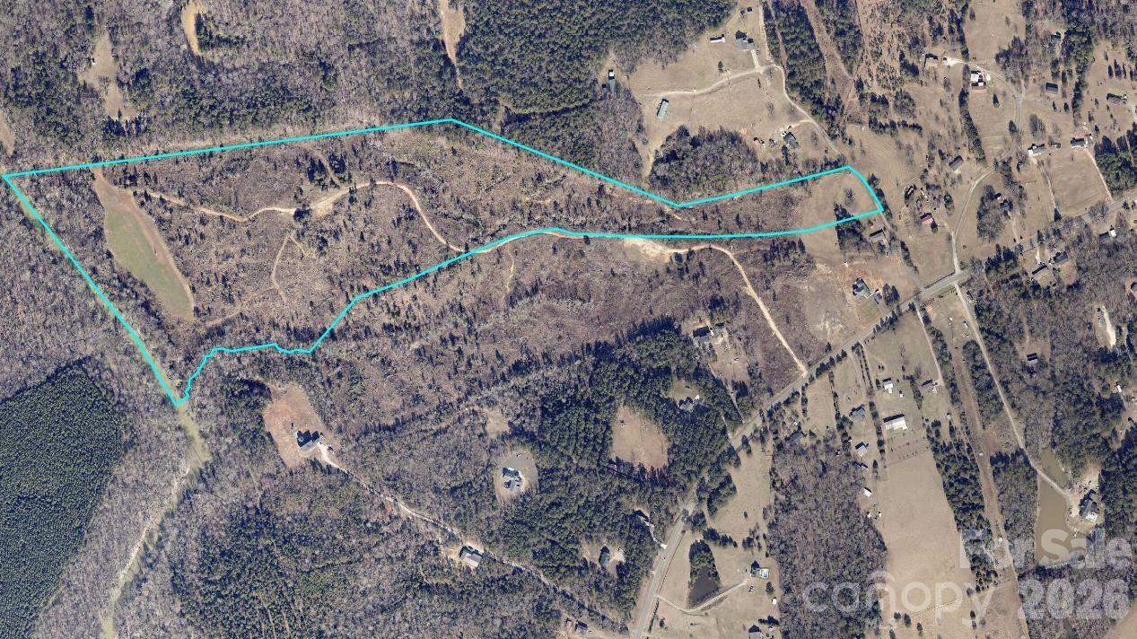 Rare opportunity to acquire approximately 50 acres in the rapidly expanding Edgemoor area of Chester County. Ideally positioned within easy reach of I-77, Rock Hill, Lancaster, and the Charlotte metropolitan region, this exceptional tract offers a unique combination of privacy, natural beauty, and long-term investment potential.
Featuring expansive acreage with a gently rolling topography, the property presents multiple possibilities for a private estate, family compound, recreational retreat, hunting, or future development opportunities, subject to applicable approvals and zoning requirements. The setting provides a desirable balance of seclusion while remaining accessible to major transportation corridors, employment centers, and regional amenities.
Located approximately four miles from recent residential development activity, the property is situated within an area experiencing continued growth and investment. Northern Chester County continues to benefit from expansion occurring throughout the greater Charlotte region, creating increasing demand for land and residential development opportunities.
Whether you're seeking a legacy property, investment acreage, or a premier homesite with room to create a custom vision, this tract offers a compelling opportunity in one of the region's emerging growth corridors.
