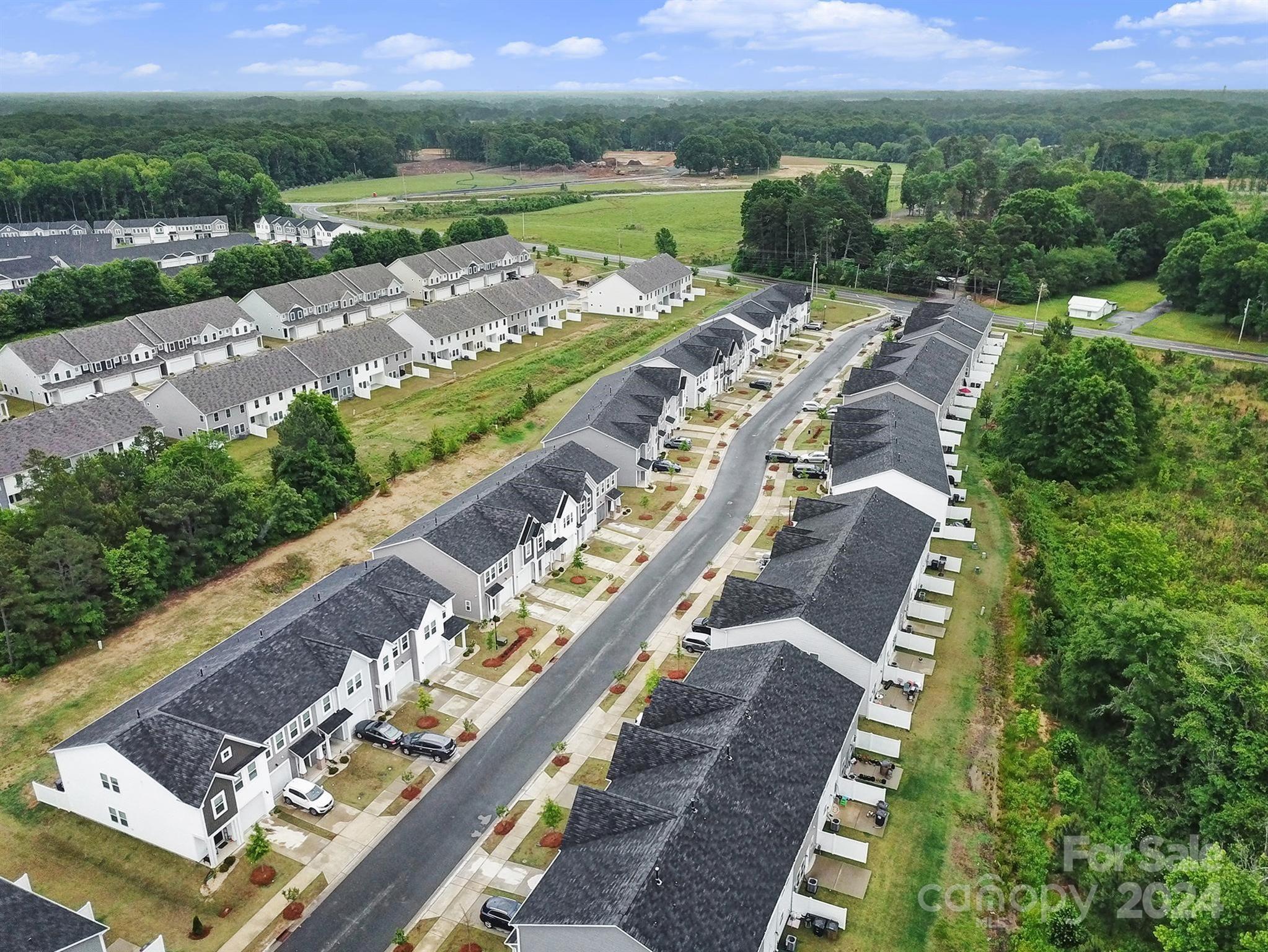 Welcome to Poplin Glen of Indian Trail! Beautiful, two-story townhomes with garages and private patios. Great chance for homeownership in a booming Union County suburb! Open concept layout with fridge, blinds, and washer/dryer included. Vinyl plank floors on main level and carpet upstairs. Spacious kitchens with granite counters and stainless appliances. Ample storage and upgraded features. Conveniently close to 74 bypass, easy access to Uptown Charlotte and nearby amenities. Amazing seller contributions up to 6% toward closing costs or rate buydown to make owning these units a reality!