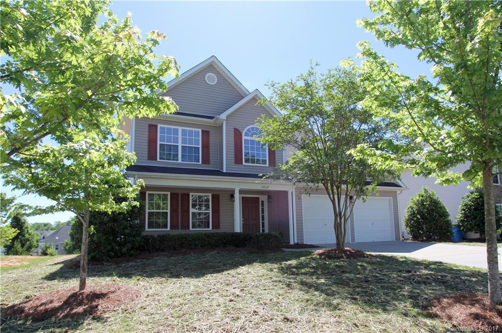 New paint throughout & carpets steam cleaned  Lovely 2 story no maintenance vinyl home located in Fort Mill. Covered rocking chair front porch with 2 car garage. Dining room w/picture frame molding. Lots of natural light. Great room with  gas logs fireplace and ceiling fan. Kitchen opens to the breakfast area and the great room for entertaining. Black appliances in kitchen. Washer and dryer in laundry room on the main floor.Master bedroom with separate sitting area. Great schools & shopping.