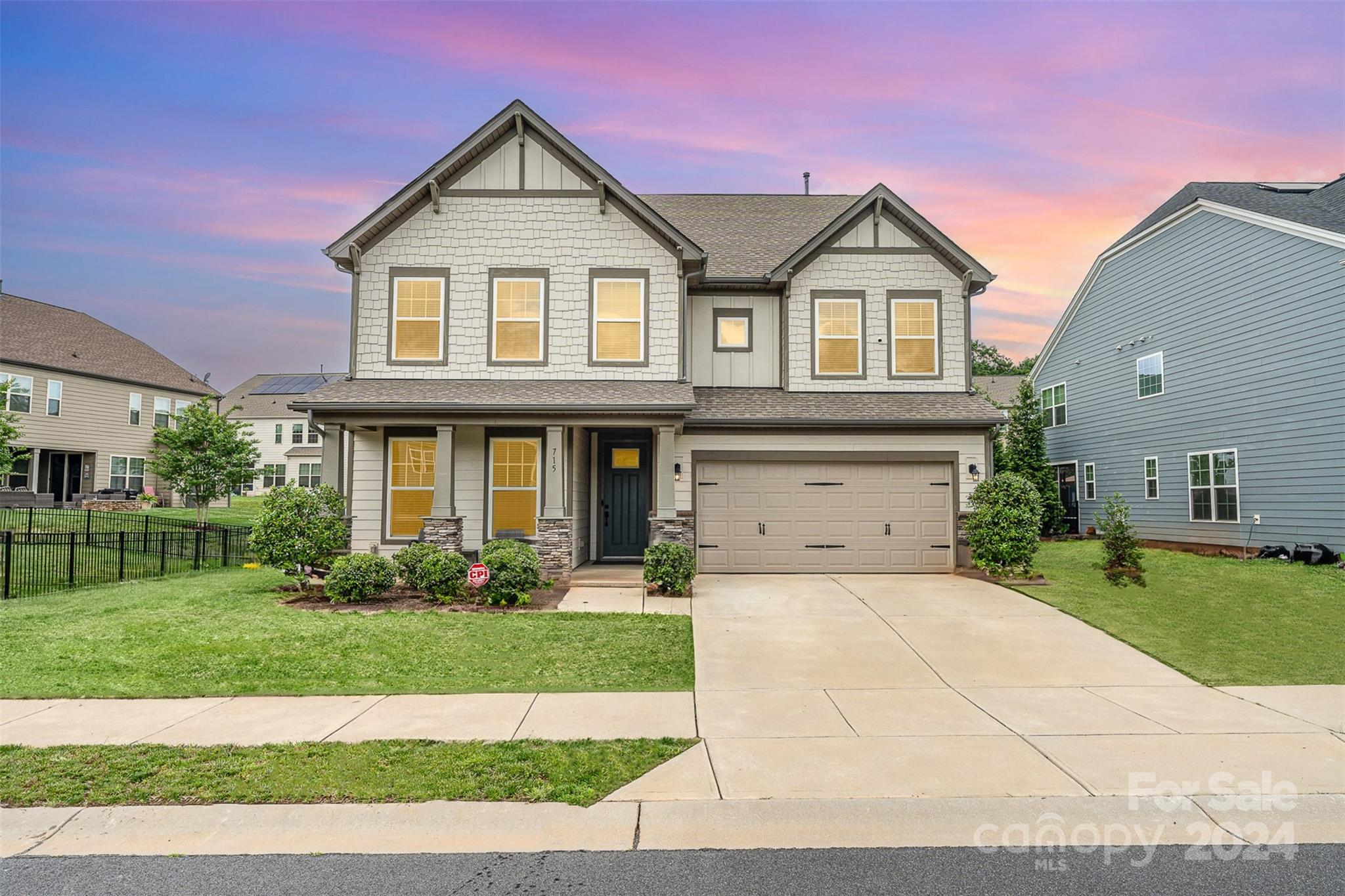 Experience the pinnacle of luxury in this immaculate 5-bedroom, 3-bathroom home. One of the larger lots in the neighborhood fenced in, this residence boasts brand NEW flooring on the second floor, enhancing the contemporary elegance of the modern kitchen with sleek quartz countertops. Energy efficiency is ensured with a brand NEW Lennox modulating furnace and HVAC system. Boasting a guest suite on the bottom floor complete with a walk-in shower. Upstairs, a spacious primary suite awaits alongside three other generously sized rooms and a loft. The third floor hosts a large bonus room with a walk-in closet, perfect for hobbies or relaxation. Situated close to downtown Fort Mill, esteemed schools, and the serene Anne Springs Greenway, with easy access to Ballantyne. Additionally, enjoy access to the pool facilities at the local recreational center - conveniently located across the street. Don't miss the chance to indulge in luxury living – schedule your showing today!