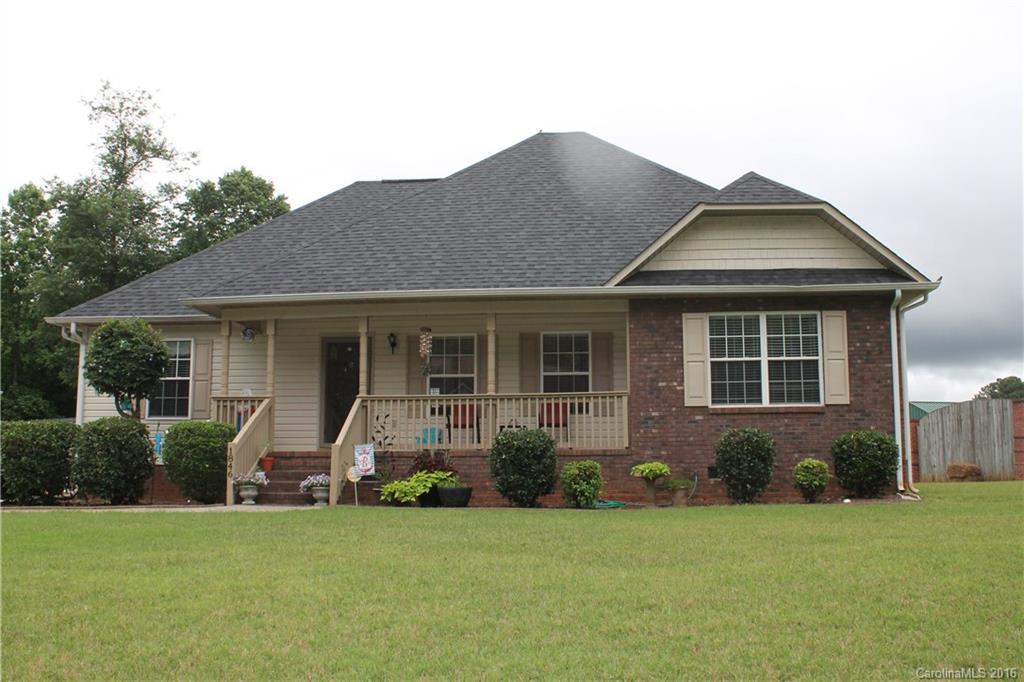 Super cute 3 bedroom ranch with 3 full baths! Split plan, laminate flooring throughout. Large lot. Fireplace in great room. Sitting room off master bedroom. Full front porch. New roof 2014. Storage building stays.